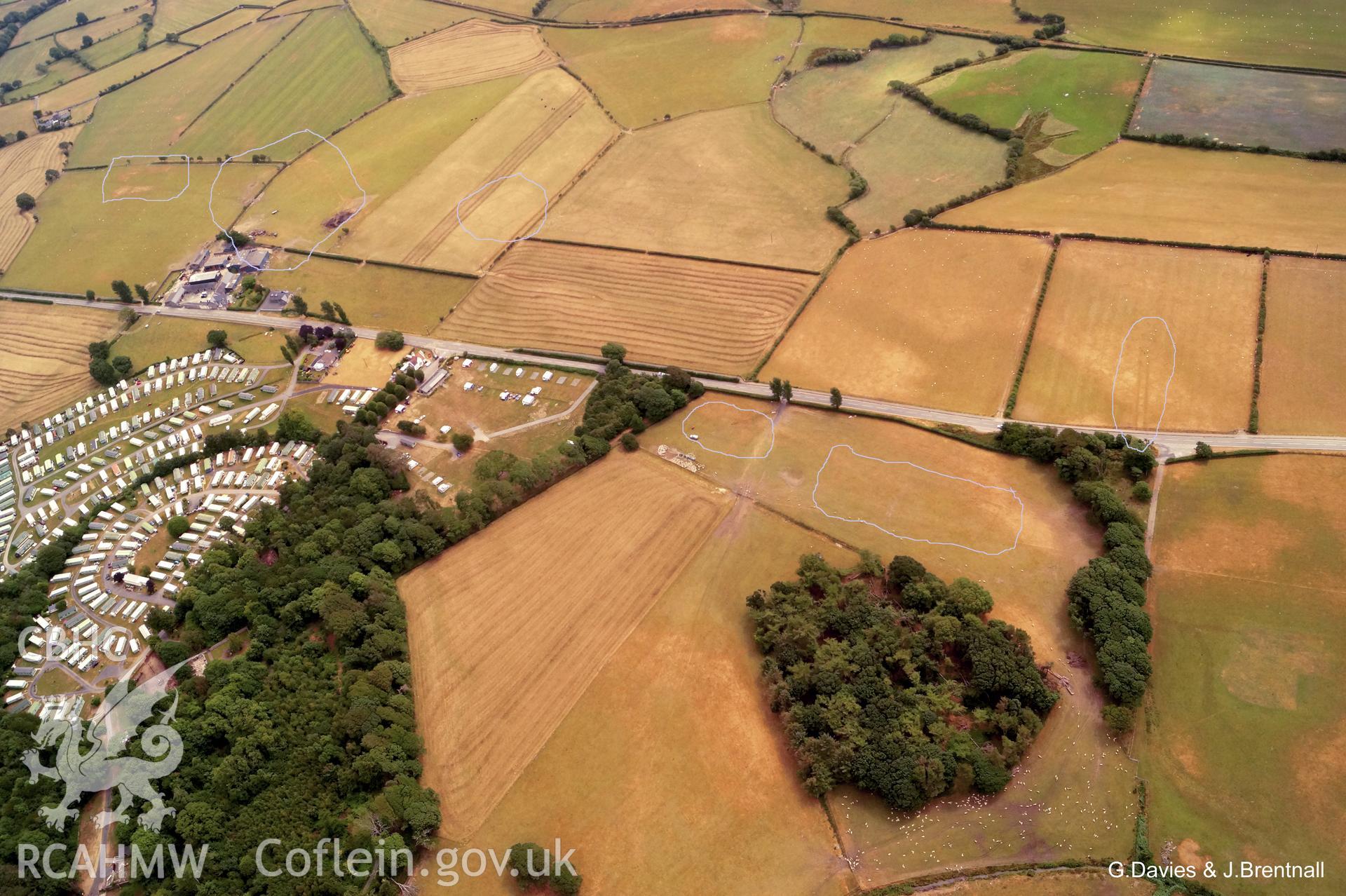 Wide shot aerial photograph of Square Barrow Cemetery & cropmarks near Ynysmaengwyn, taken by Glyn Davies & Jonathan Brentnall 16/07/2018 under drought conditions. Photograph modified & archaeological features highlighted. Original photograph:BDC_04_03_02.