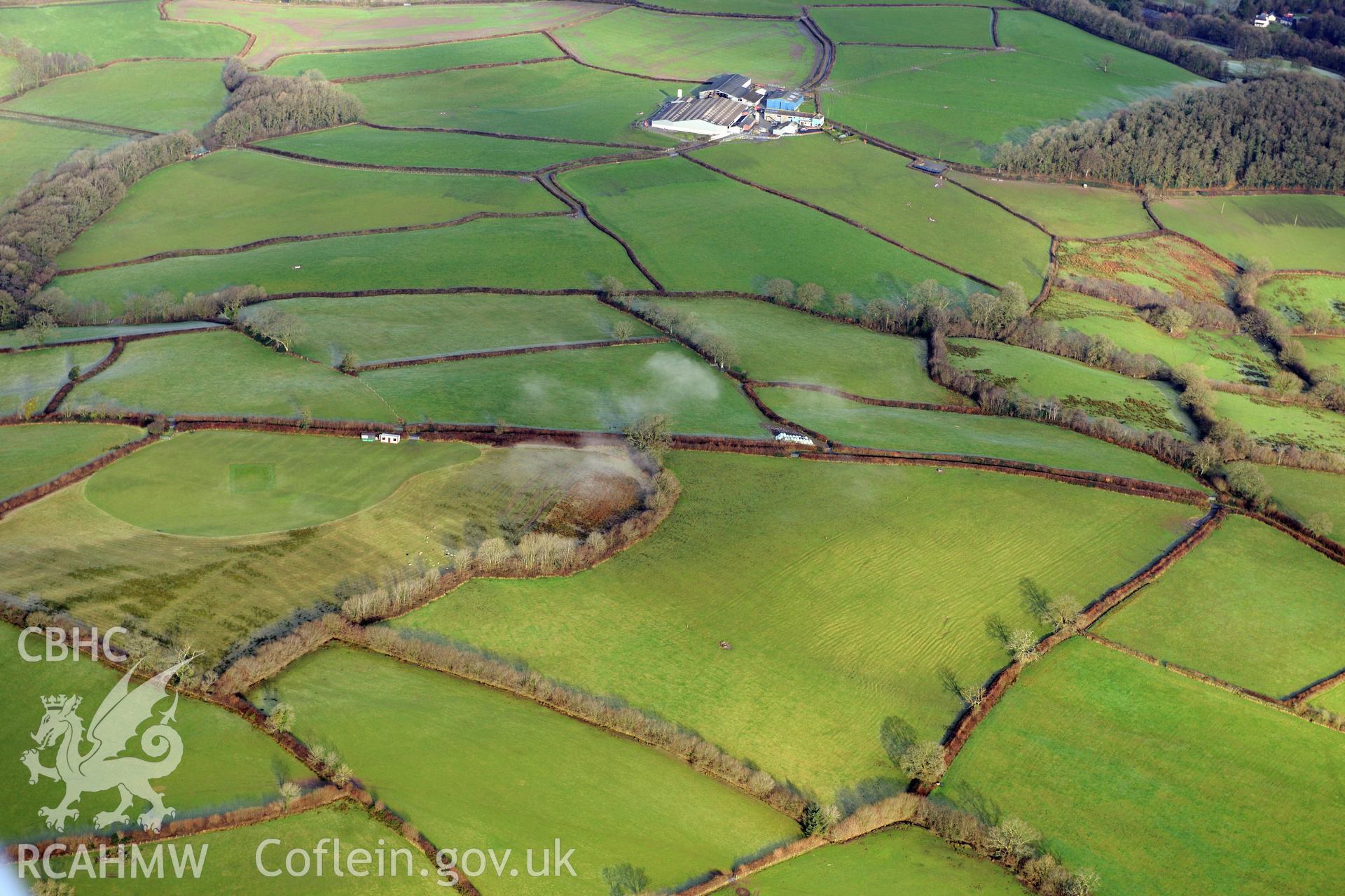 Cwm Bran camp or Cefn-y-Gaer enclosure, Llansadwrn, south west of Llandovery. Oblique aerial photograph taken during the Royal Commission?s programme of archaeological aerial reconnaissance by Toby Driver on 15th January 2013.