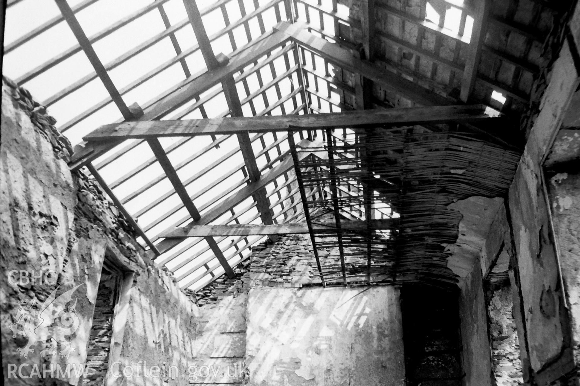 Digitised black and white photograph showing 'roof construction: a house at Cwmystwyth.' Photographed by Martin Davies as part of his Bachelor of Architecture dissertation from the University of Nottingham, 1979.