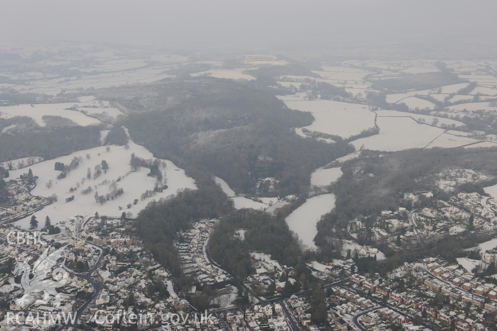 Dinas Powys Castle and the Southern Banks defended enclosure at Dinas Powys, west of Penarth, Cardiff. Oblique aerial photograph taken during the Royal Commission?s programme of archaeological aerial reconnaissance by Toby Driver on 24th January 2013.