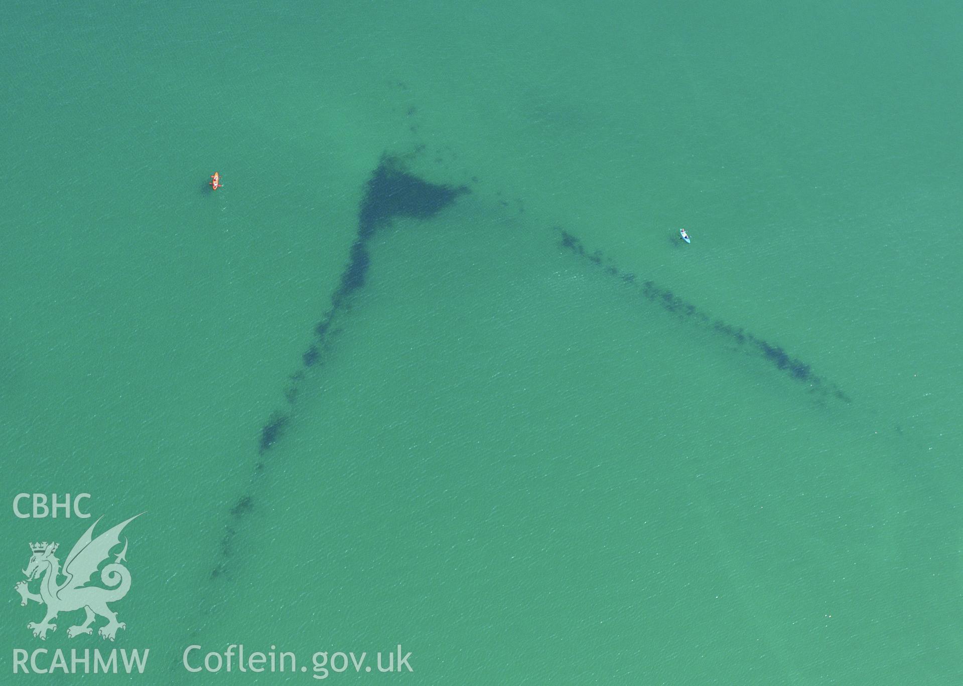 Oxwich Bay Fish Traps 1 and 2, on the southern coast of the Gower Peninsula. Oblique aerial photograph taken during the Royal Commission?s programme of archaeological aerial reconnaissance by Toby Driver on 16th July 2013.