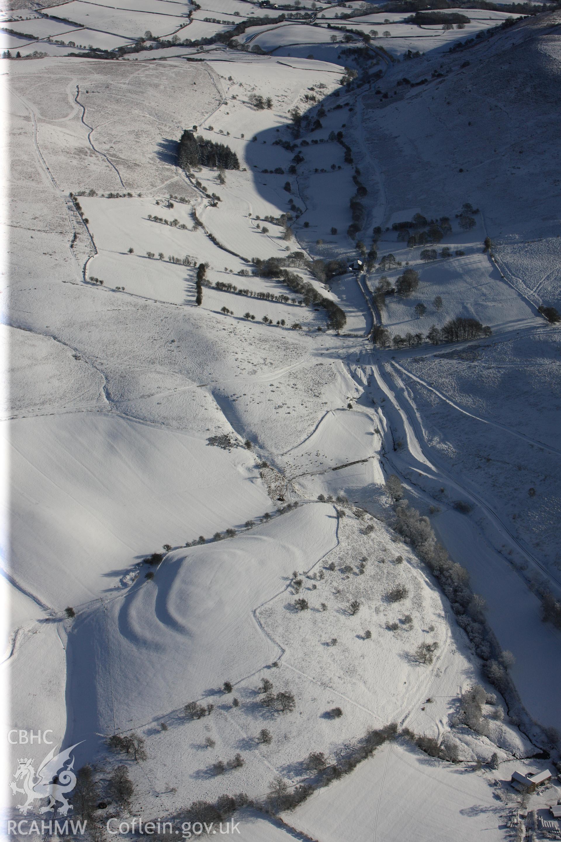 Wern Camp defended enclosure, Glascwm, north east of Builth Wells. Oblique aerial photograph taken during the Royal Commission?s programme of archaeological aerial reconnaissance by Toby Driver on 15th January 2013.