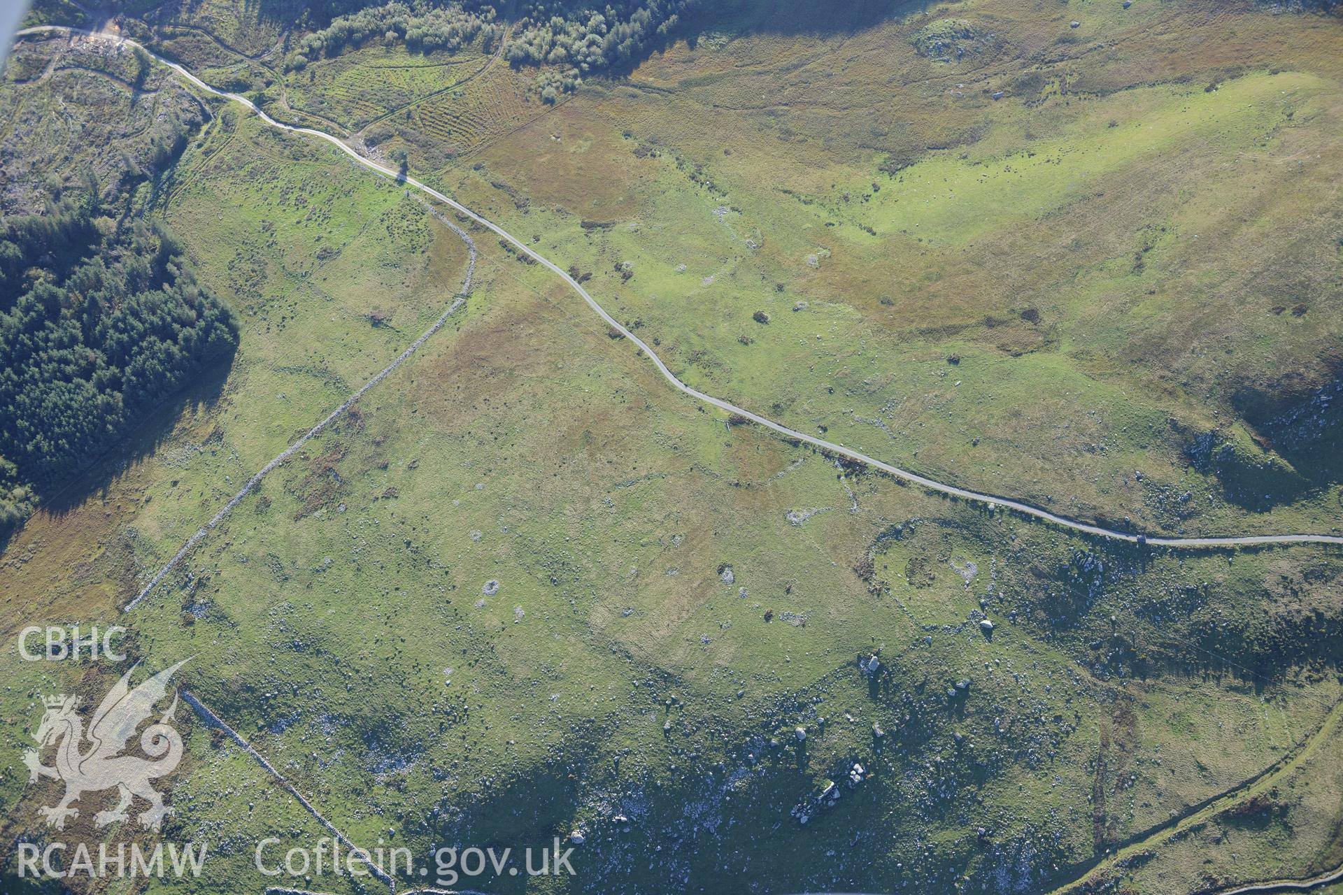 Bryn Seward settlement, south east of Fairbourne. Oblique aerial photograph taken during the Royal Commission's programme of archaeological aerial reconnaissance by Toby Driver on 2nd October 2015.