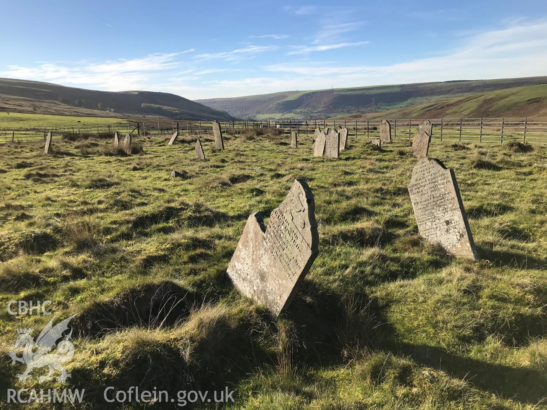 Detailed view of gravestones at the Tredegar Ironworks cholera cemetery. Colour photograph taken by Paul R. Davis on 24th October 2018.