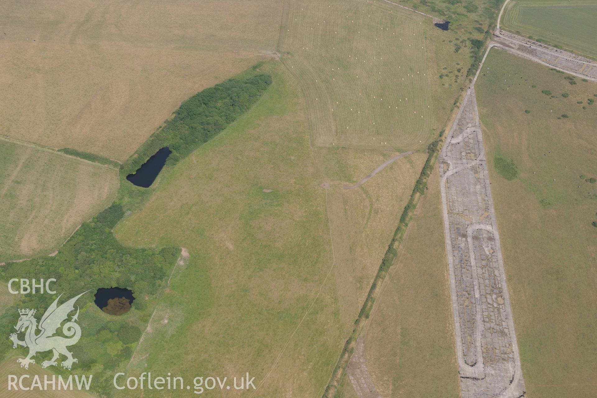 Uncertain cropmarks at Talbenny Airfield (SM 829 112). Oblique aerial photograph taken during the Royal Commission?s programme of archaeological aerial reconnaissance by Toby Driver on 16th July 2013.