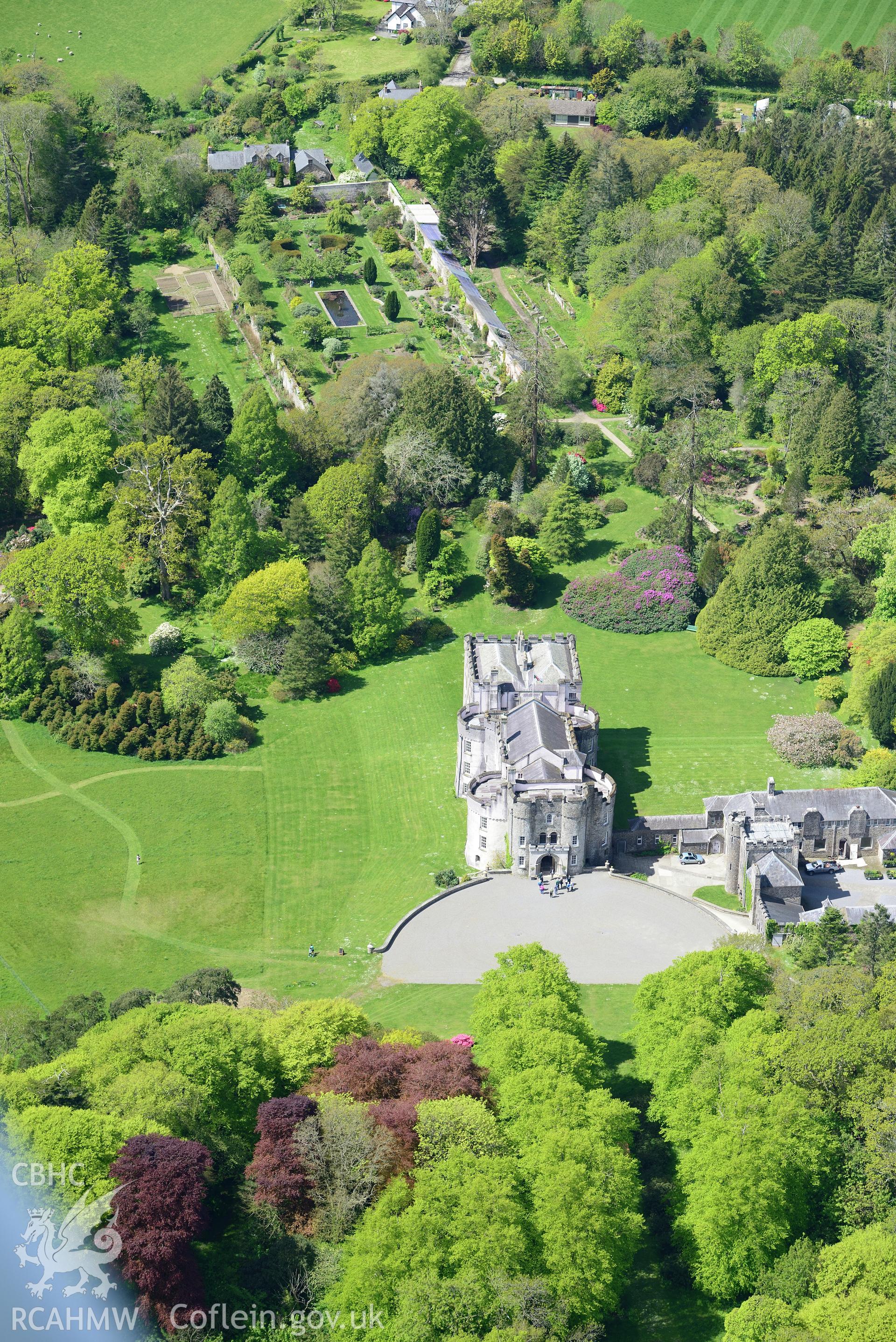 Picton Castle and gardens, Slebech. Oblique aerial photograph taken during the Royal Commission's programme of archaeological aerial reconnaissance by Toby Driver on 13th May 2015.