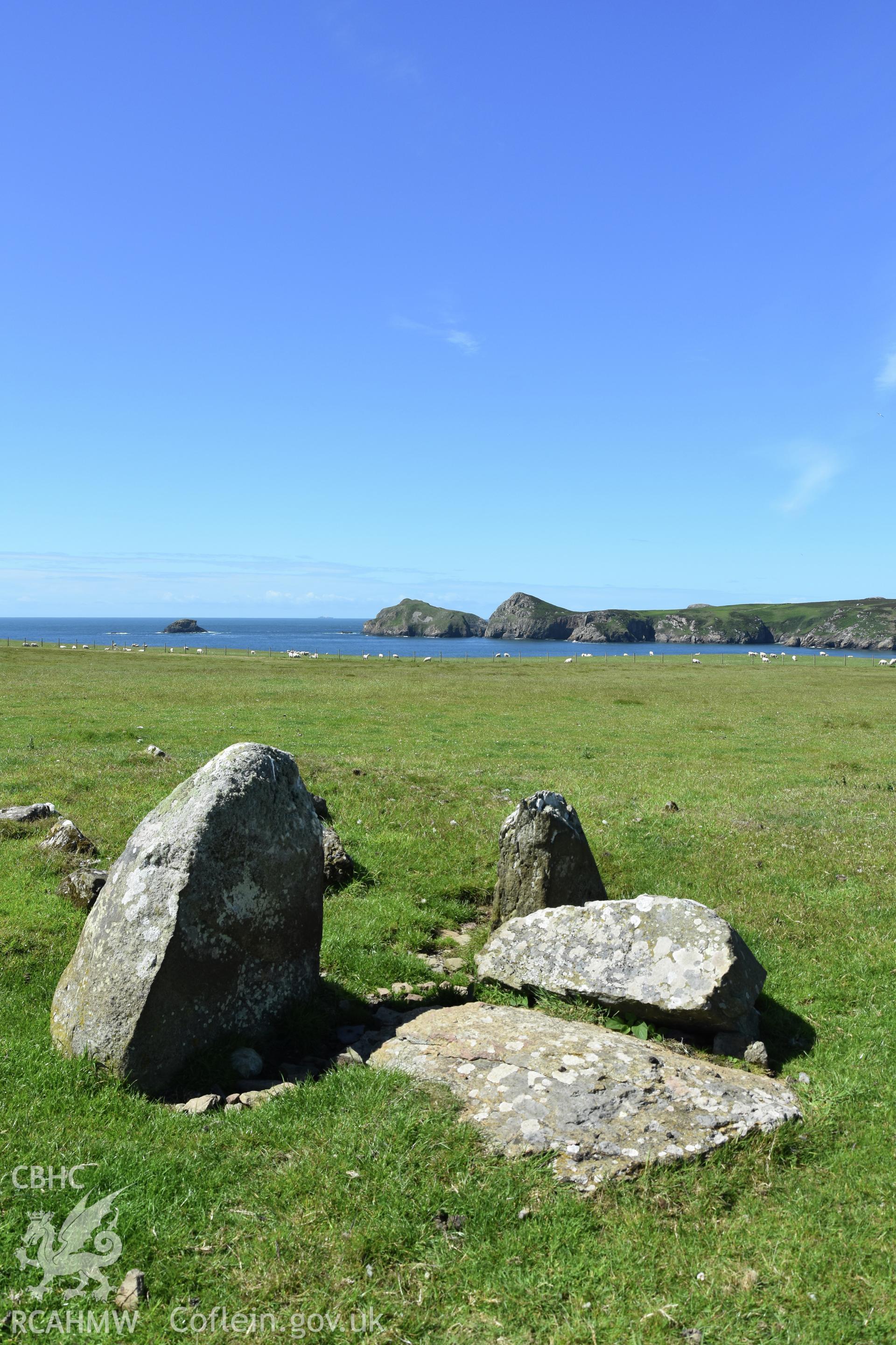 Lower Treginnis chambered tomb. View looking south-west over Ramsey Sound. Investigator?s photographic survey for the CHERISH Project. ? Crown: CHERISH PROJECT 2019. Produced with EU funds through the Ireland Wales Co-operation Programme 2014-2020. All material made freely available through the Open Government Licence.