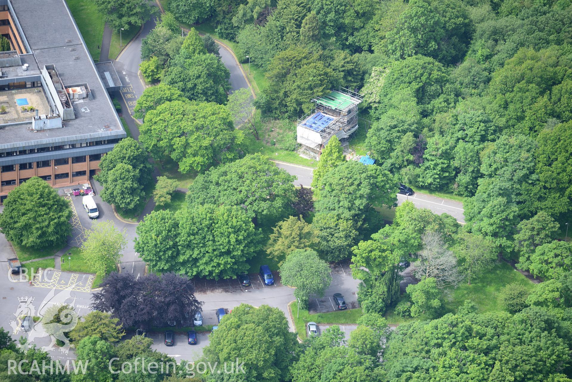 The Equatorial Observatory; Lliw Valley (or Penllergaer) civic centre and the site of Penllergaer House at Penllergaeth Park, Swansea. Oblique aerial photograph taken during the Royal Commission's programme of archaeological aerial reconnaissance by Toby Driver on 19th June 2015.