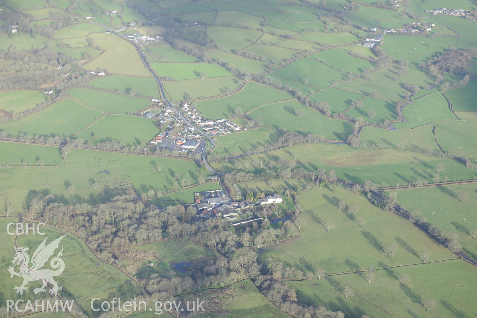 Talsarn village, and Llanllyr manison and gardens. Oblique aerial photograph taken during the Royal Commission's programme of archaeological aerial reconnaissance by Toby Driver on 6th January 2015.