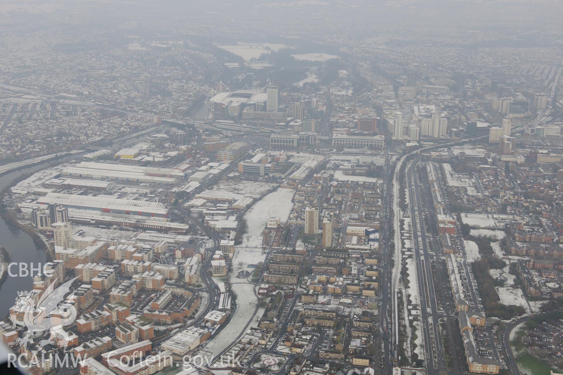 Butetown, with Cardiff Millennium Stadium beyond, Cardiff. Oblique aerial photograph taken during the Royal Commission?s programme of archaeological aerial reconnaissance by Toby Driver on 24th January 2013.