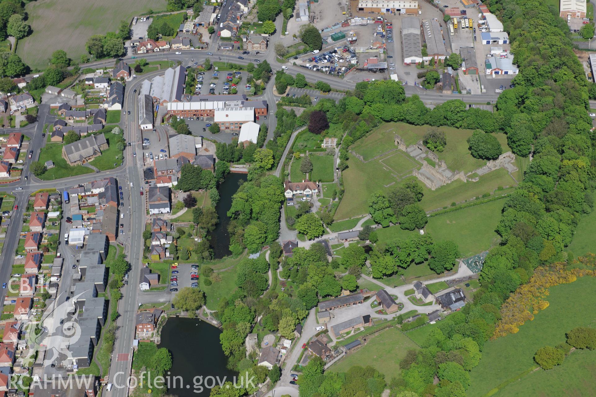 Basingwerk Abbey and the town of Holywell. Oblique aerial photograph taken during the Royal Commission?s programme of archaeological aerial reconnaissance by Toby Driver on 22nd May 2013.