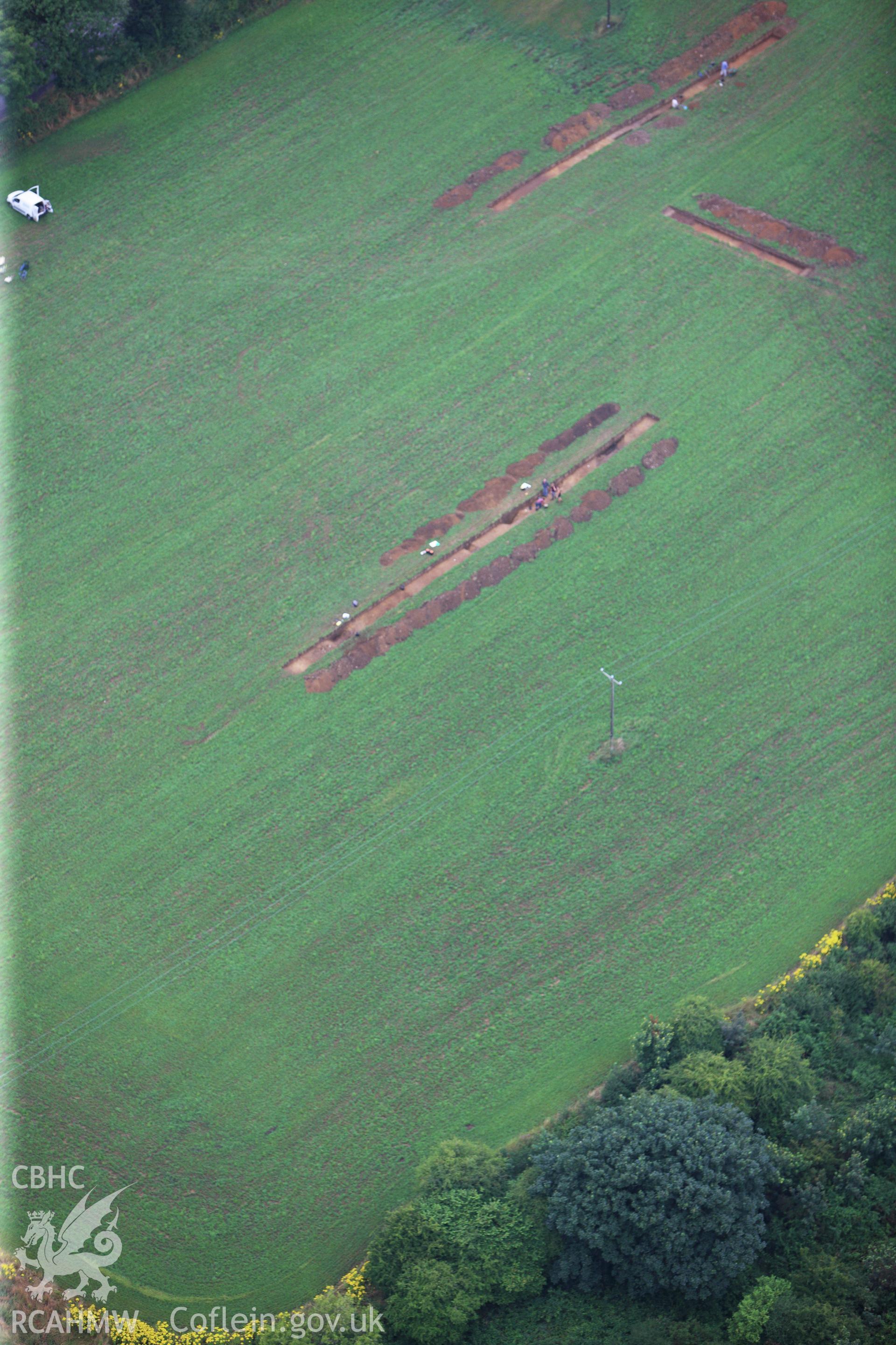 Wiston Roman Fort with excavations by Dyfed Archaeological Trust, north east of Haverfordwest. Oblique aerial photograph taken during the Royal Commission?s programme of archaeological aerial reconnaissance by Toby Driver on 1st August 2013.