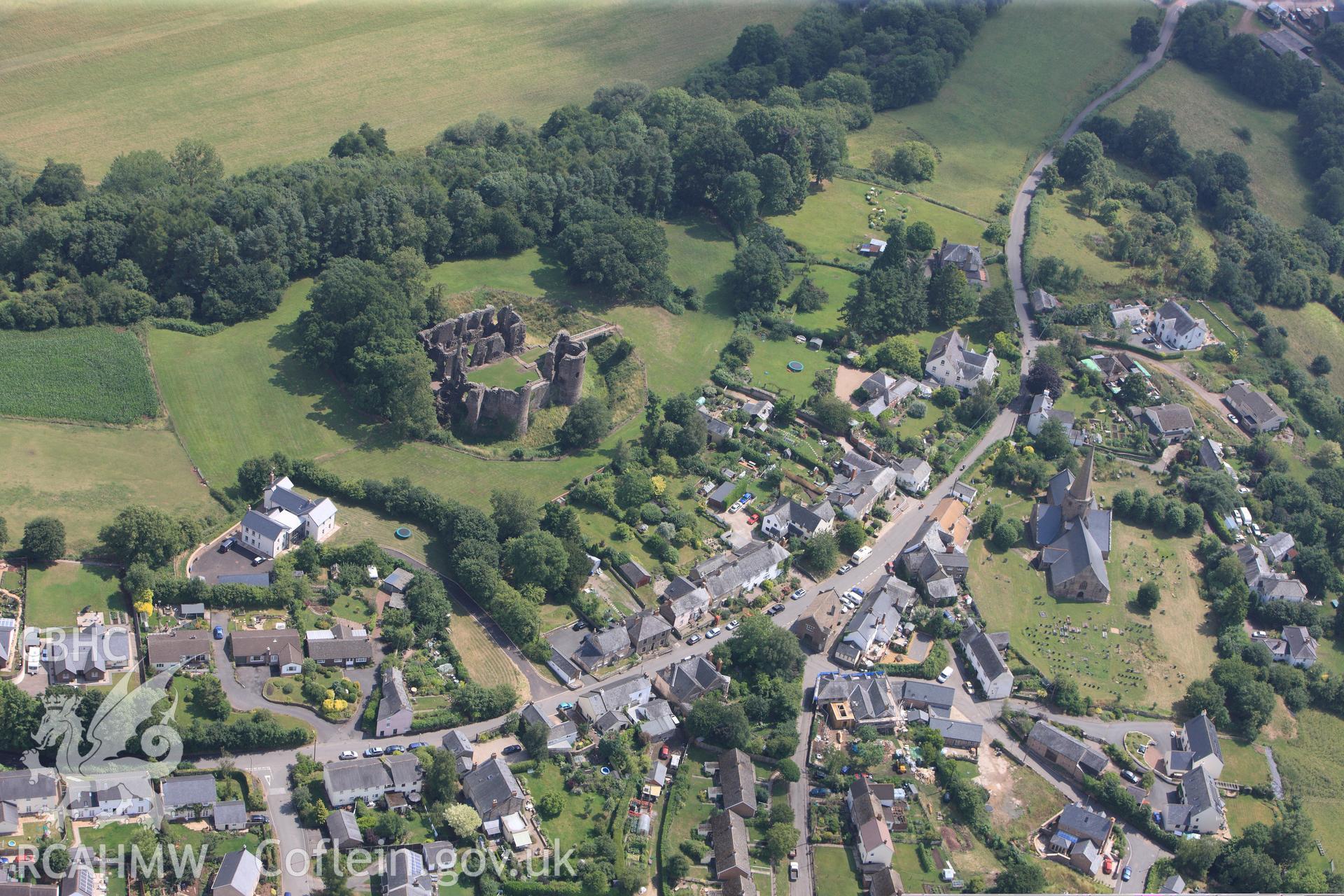 St. Nicholas' Church and Grosmont Castle, in the town of Grosmont, north east of Abergavenny. Oblique aerial photograph taken during the Royal Commission?s programme of archaeological aerial reconnaissance by Toby Driver on 1st August 2013.