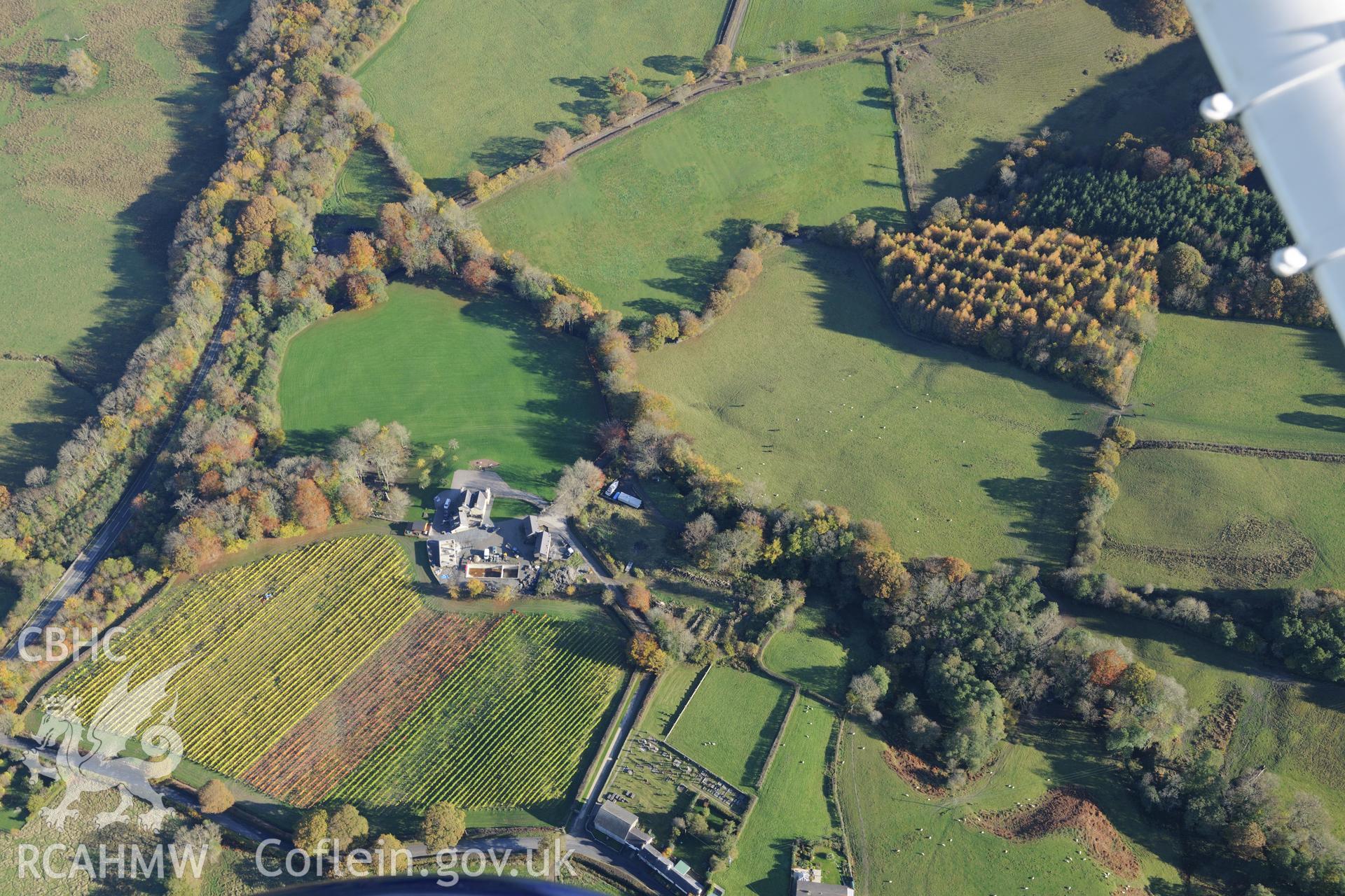 Llaethlliw Farm and Neuadd-Lwyd Welsh Independent chapel and graveyard, near Aberaeron. Oblique aerial photograph taken during the Royal Commission's programme of archaeological aerial reconnaissance by Toby Driver on 2nd November 2015.