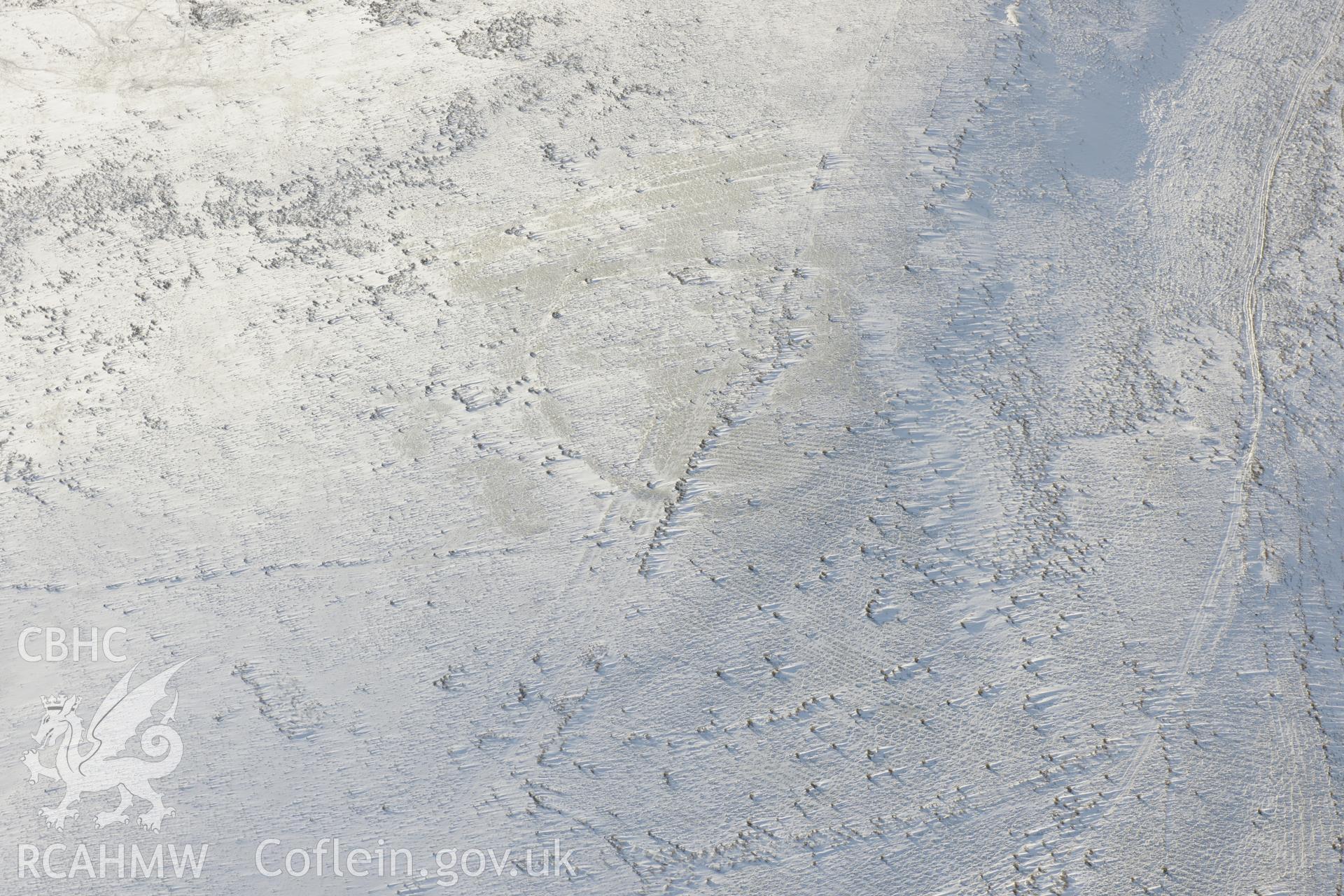 Graig Fawr (west) enclosure or possible hillfort, north of Pontarddulais. Oblique aerial photograph taken during the Royal Commission?s programme of archaeological aerial reconnaissance by Toby Driver on 24th January 2013.