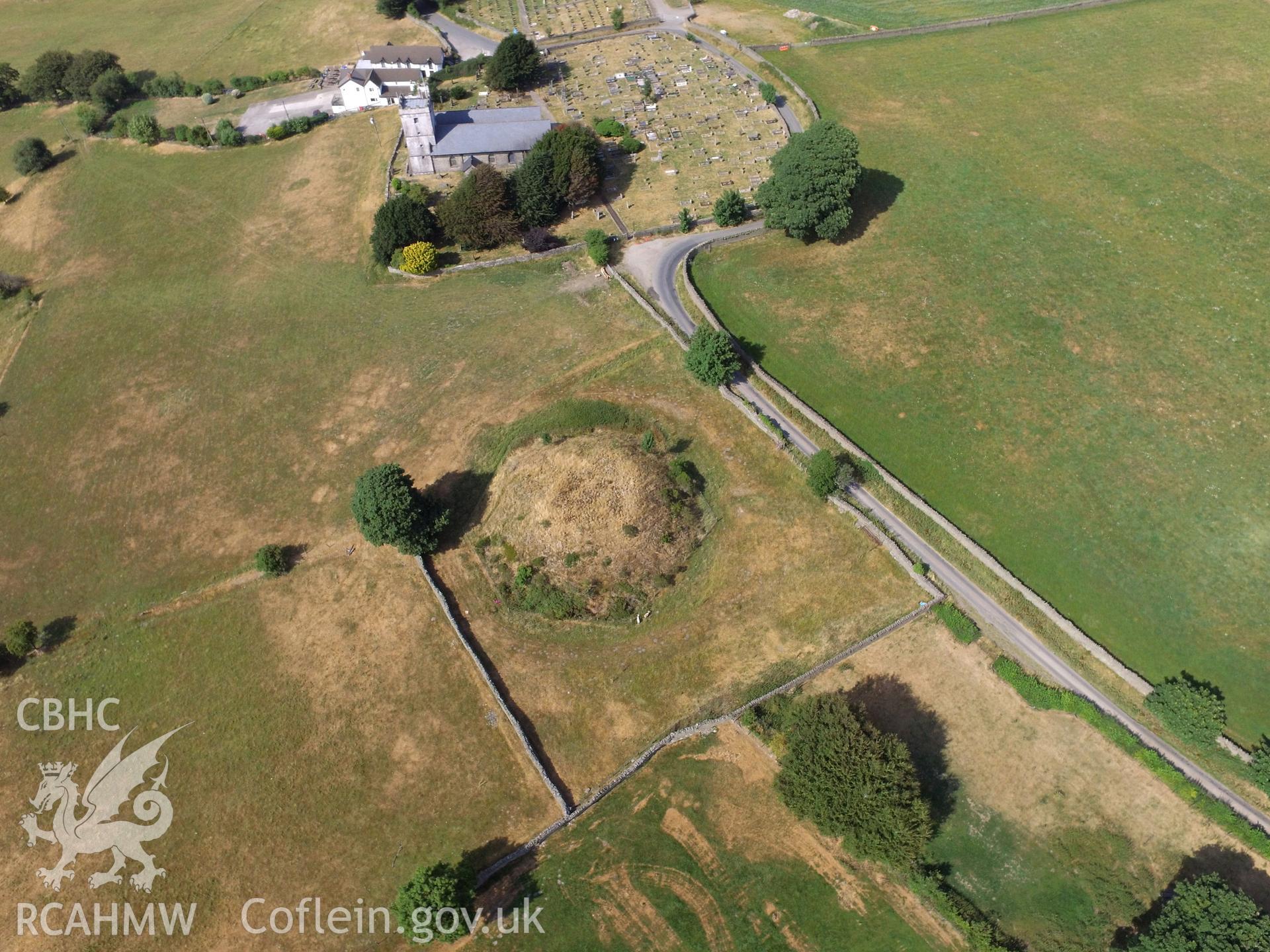 Aerial view of Tywyn Tudur Motte and St. Tudur's church, Mynyddislwyn, Ynysddu, north west of Newport. Colour photograph taken by Paul R. Davis on 19th July 2018.