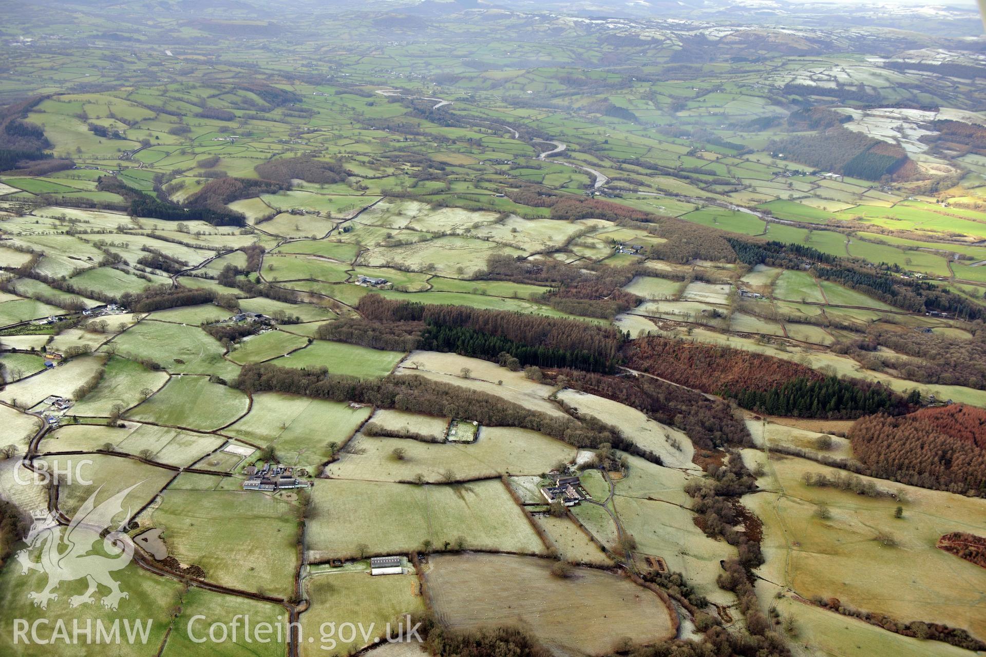 Llwynywormwood Farmstead, south of Llandovery. Oblique aerial photograph taken during the Royal Commission?s programme of archaeological aerial reconnaissance by Toby Driver on 15th January 2013.