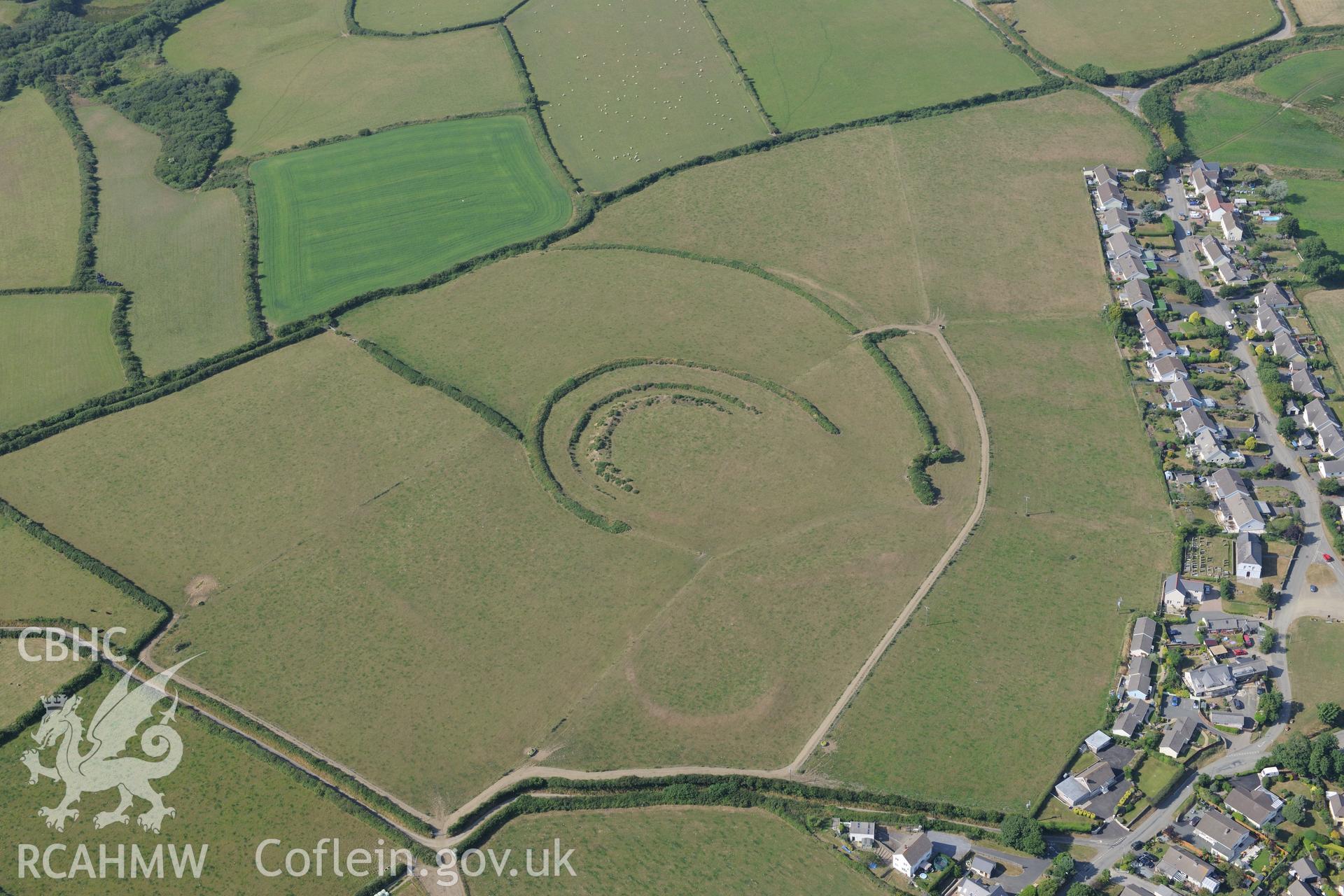 Keeston Castle hillfort, north west of Haverford West. Oblique aerial photograph taken during the Royal Commission?s programme of archaeological aerial reconnaissance by Toby Driver on 16th July 2013.