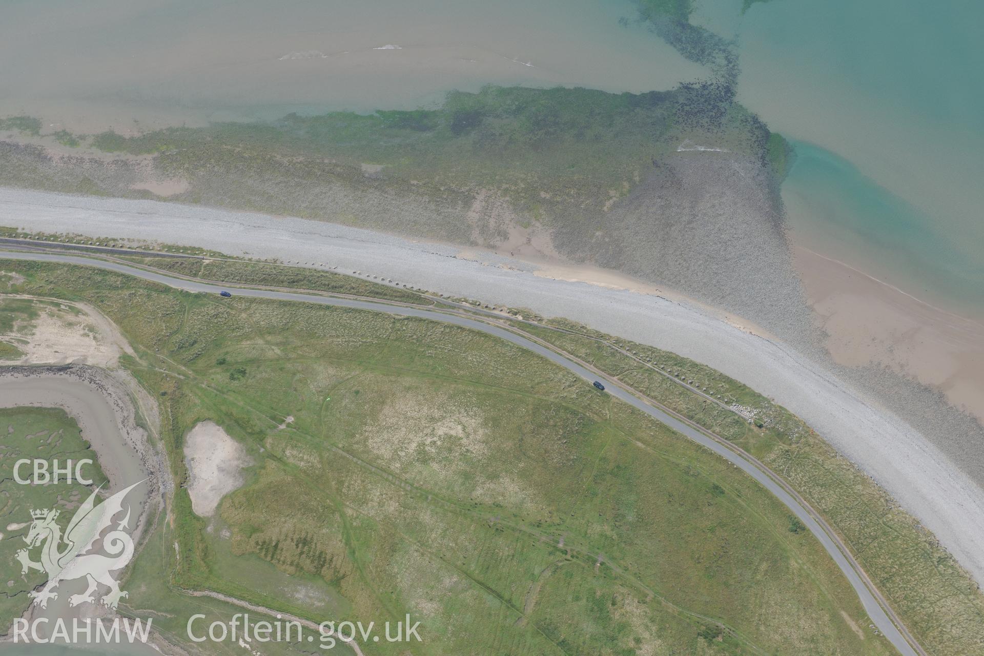 Fairbourne anti-invasion defences, including pillbox. Oblique aerial photograph taken during the Royal Commission?s programme of archaeological aerial reconnaissance by Toby Driver on 12th July 2013.