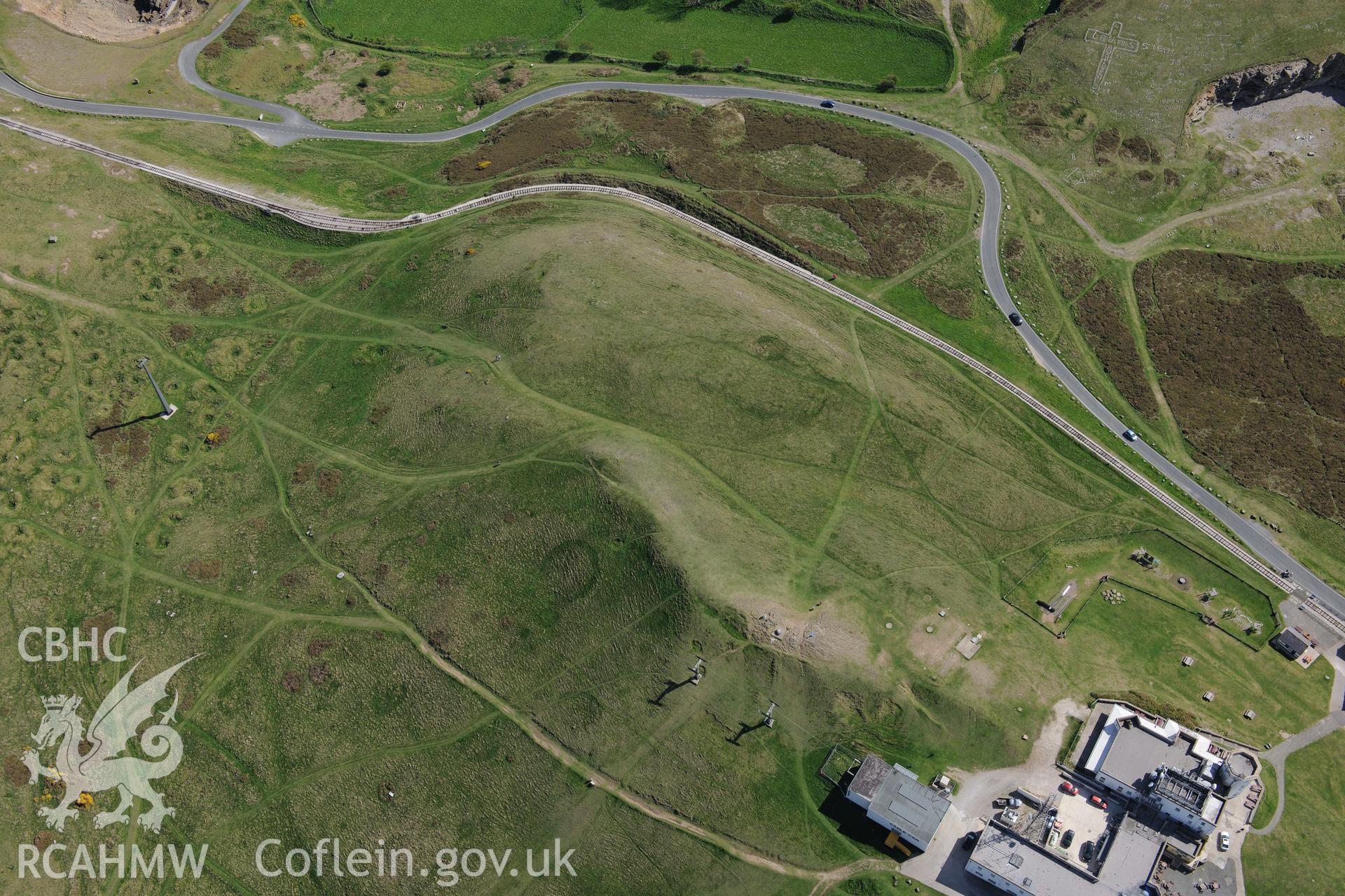 Great Orme visitor centre, Great Ormes Head telegraph station and the Telegraph Hotel. Oblique aerial photograph taken during the Royal Commission?s programme of archaeological aerial reconnaissance by Toby Driver on 22nd May 2013.