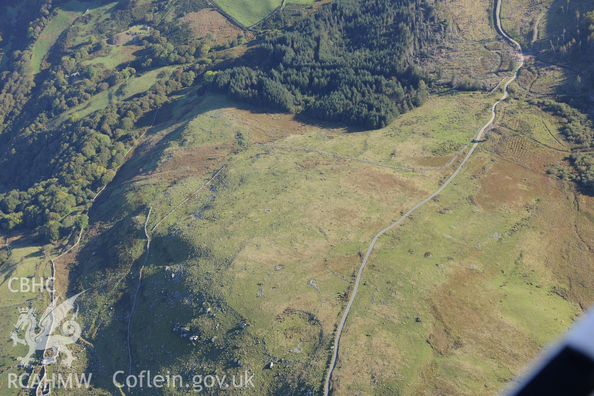 Bryn Seward settlement, south east of Fairbourne. Oblique aerial photograph taken during the Royal Commission's programme of archaeological aerial reconnaissance by Toby Driver on 2nd October 2015.