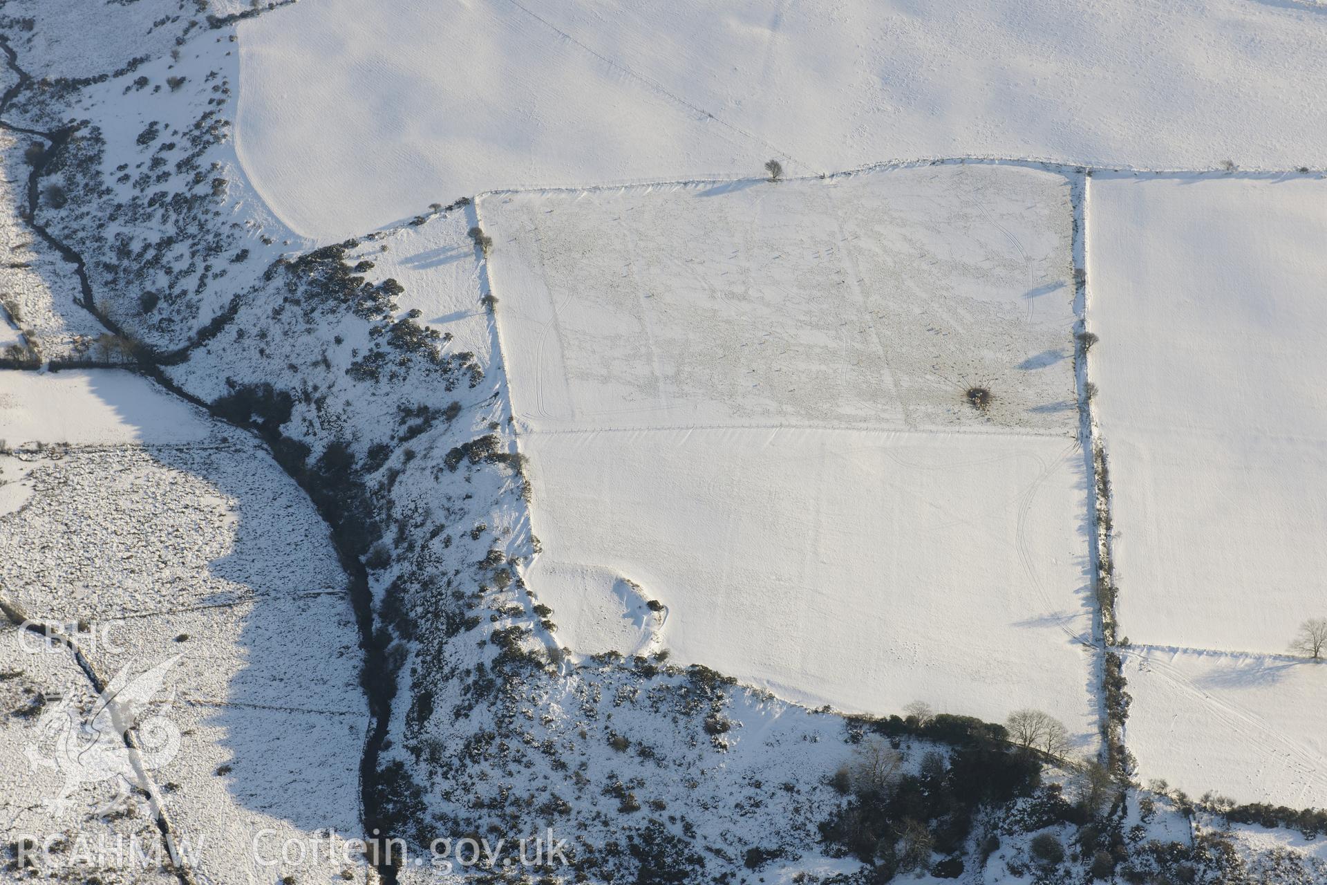 Parc Castell enclosure, Wern Camp, Castlebythe. Oblique aerial photograph taken during the Royal Commission?s programme of archaeological aerial reconnaissance by Toby Driver on 24th January 2013.