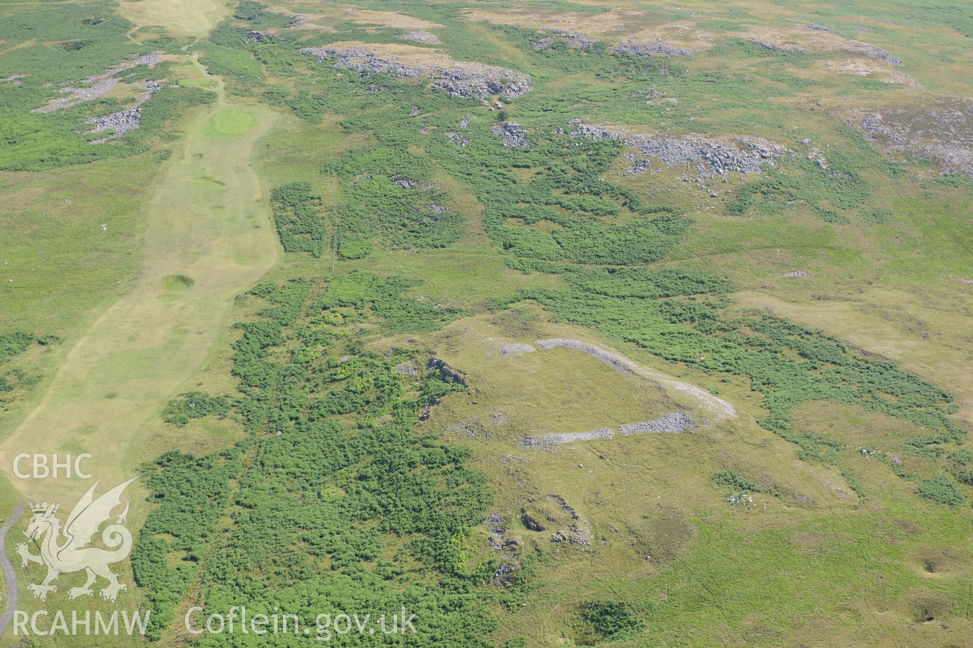 Cefn Cilsanws enclosure, north west of Merthyr Tyfil. Oblique aerial photograph taken during the Royal Commission?s programme of archaeological aerial reconnaissance by Toby Driver on 1st August 2013.