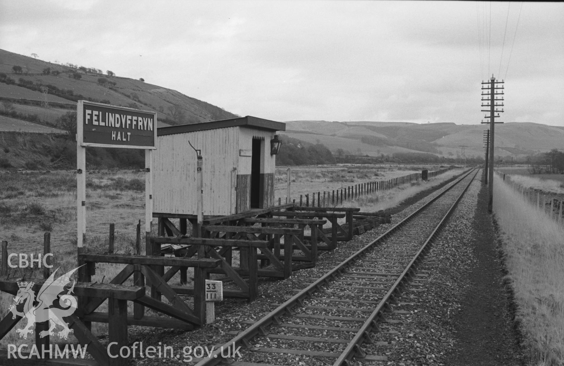 Digital copy of a black and white negative showing partly dismantled Felin Dyffryn railway halt, Llanilar. Photographed by Arthur O. Chater in April 1965 from Grid Reference SN 6515 7440, looking east south east.