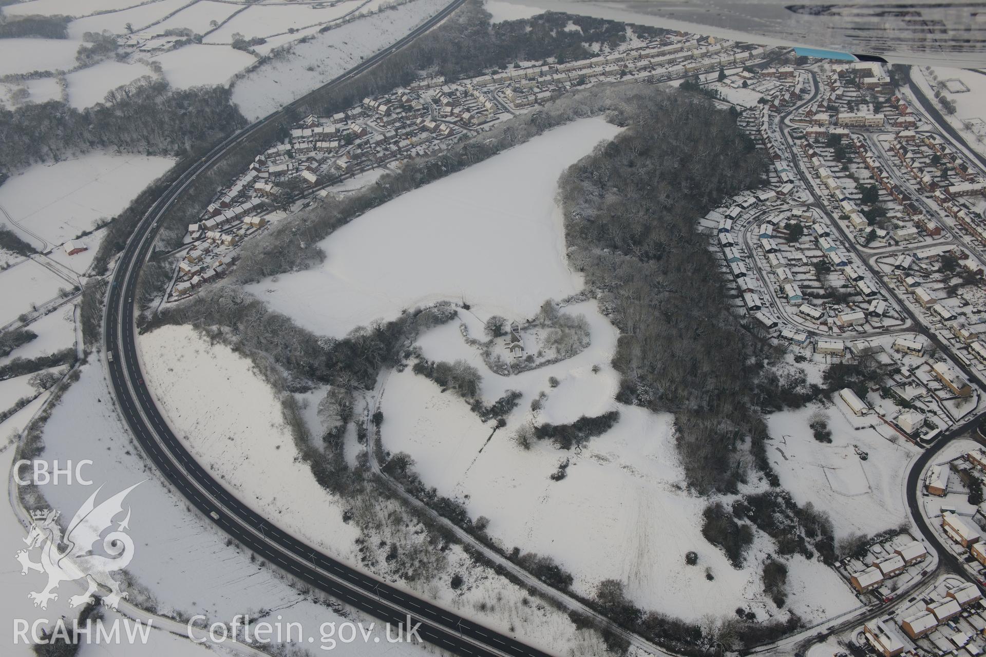 St Mary's church, Caerau Castle ringwork and Caerau Hillfort, Caerau, Cardiff. Oblique aerial photograph taken during the Royal Commission?s programme of archaeological aerial reconnaissance by Toby Driver on 24th January 2013.