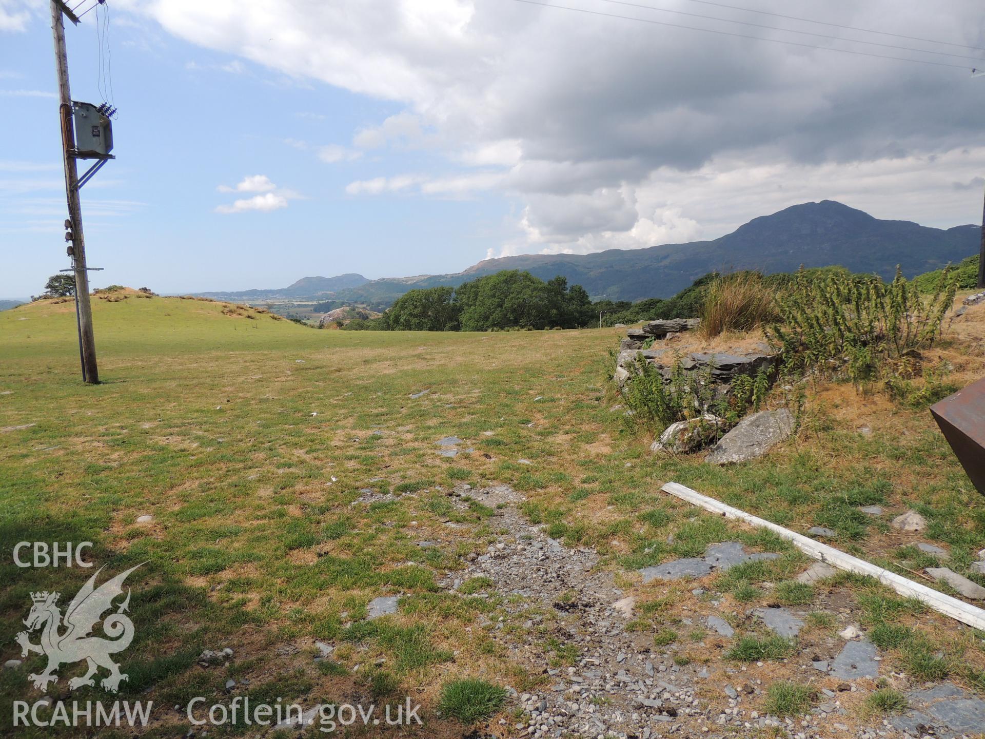 'View west south-west toward development from Parc.' Photographed as part of desk based assessment and heritage impact assessment of a hydro scheme on the Afon Croesor, Brondanw Estate, Gwynedd. Produced by Archaeology Wales for Renewables First Ltd. 2018.