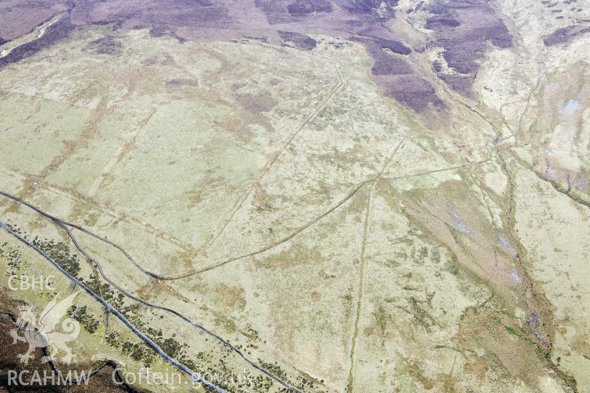 Pen Plaenau Roman Marching Camp, in the Berwyn Mountains south west of Llangollen. Oblique aerial photograph taken during the Royal Commission?s programme of archaeological aerial reconnaissance by Toby Driver on 28th February 2013.
