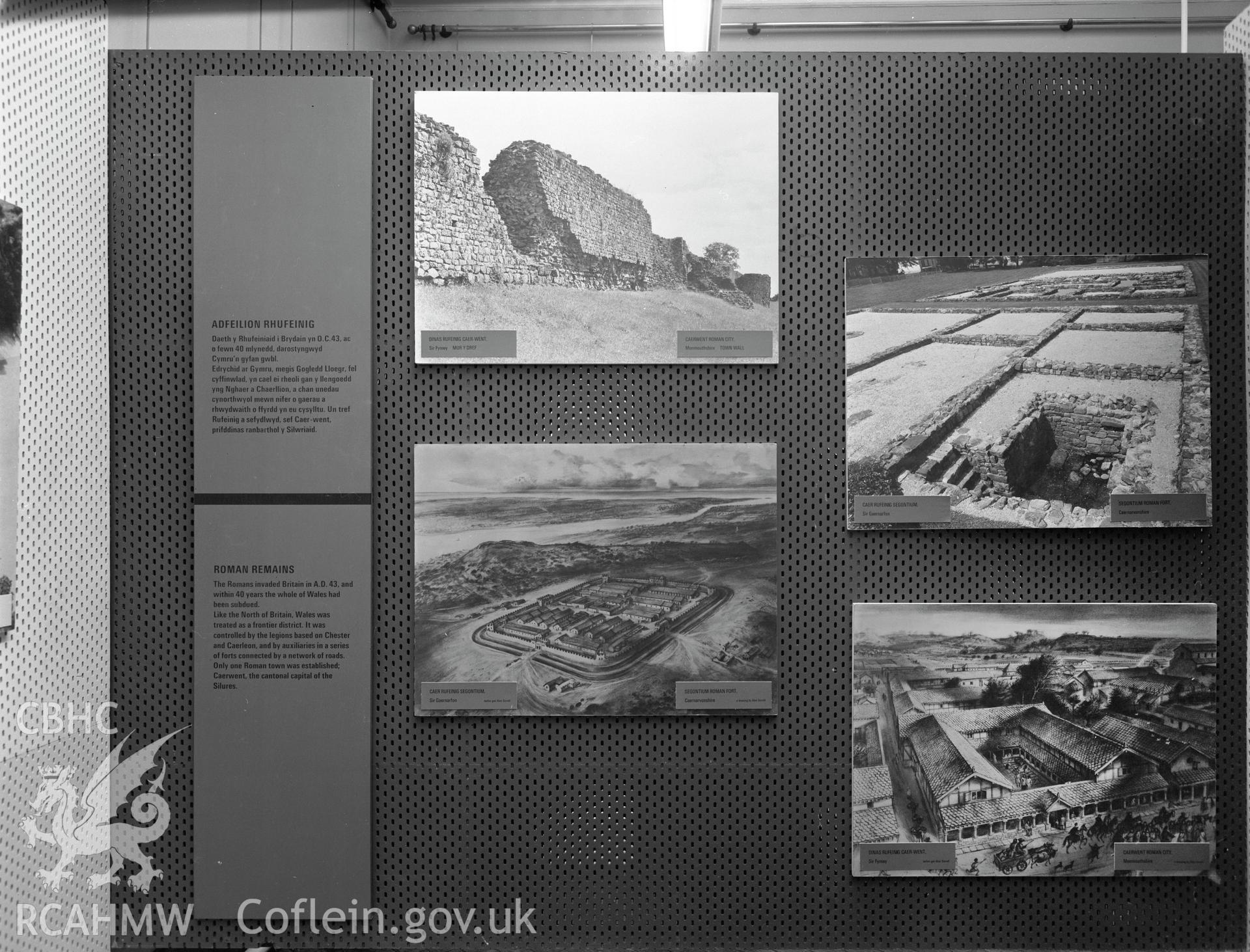 Digital copy of a black and white negative showing Ancient Monuments Exhibition, Welsh Tourer, Vivian Art Gallery, Swansea. From Cadw Monuments in Care Collection.