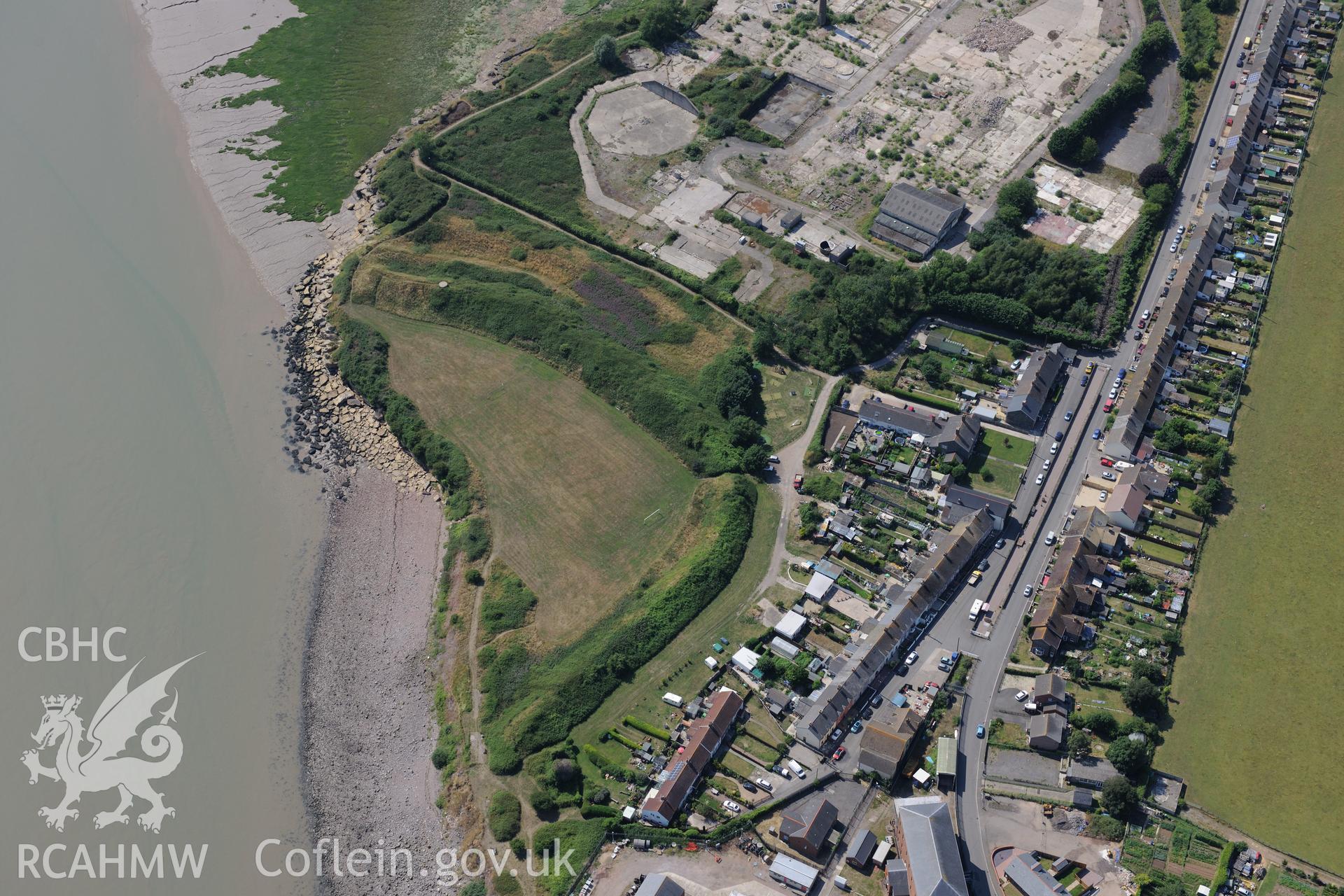 The village of Sudbrook, east of Caldicot, with Sudbrook fort and the remains of Sudbrook medieval village. Oblique aerial photograph taken during the Royal Commission?s programme of archaeological aerial reconnaissance by Toby Driver on 1st August 2013.