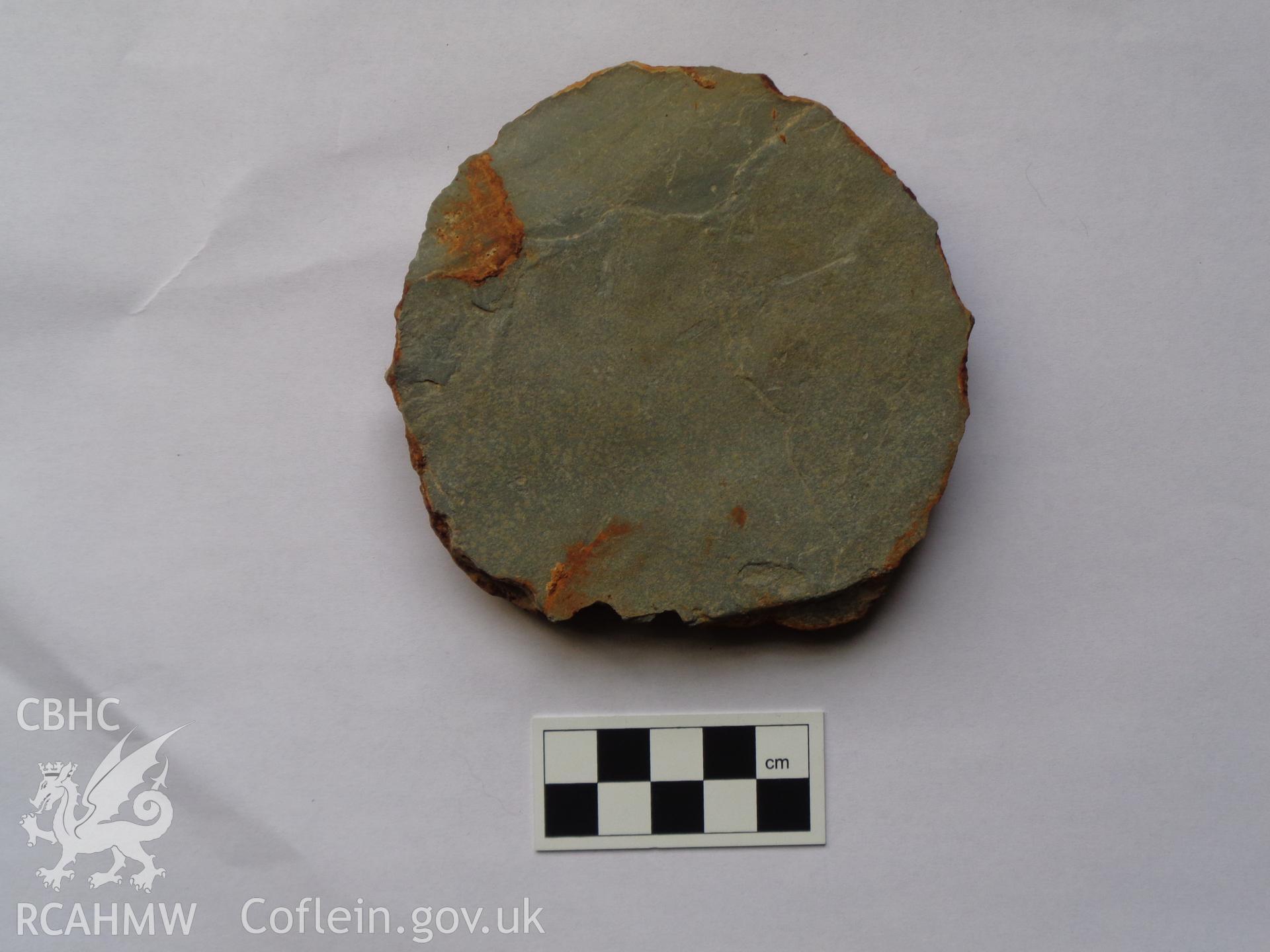 Photographic record of pot lid (side B) found during archaeological work at Gogerddan Campus, Aberystwyth carried out by Archaeology Wales, 2016-2017. Project No 2460.