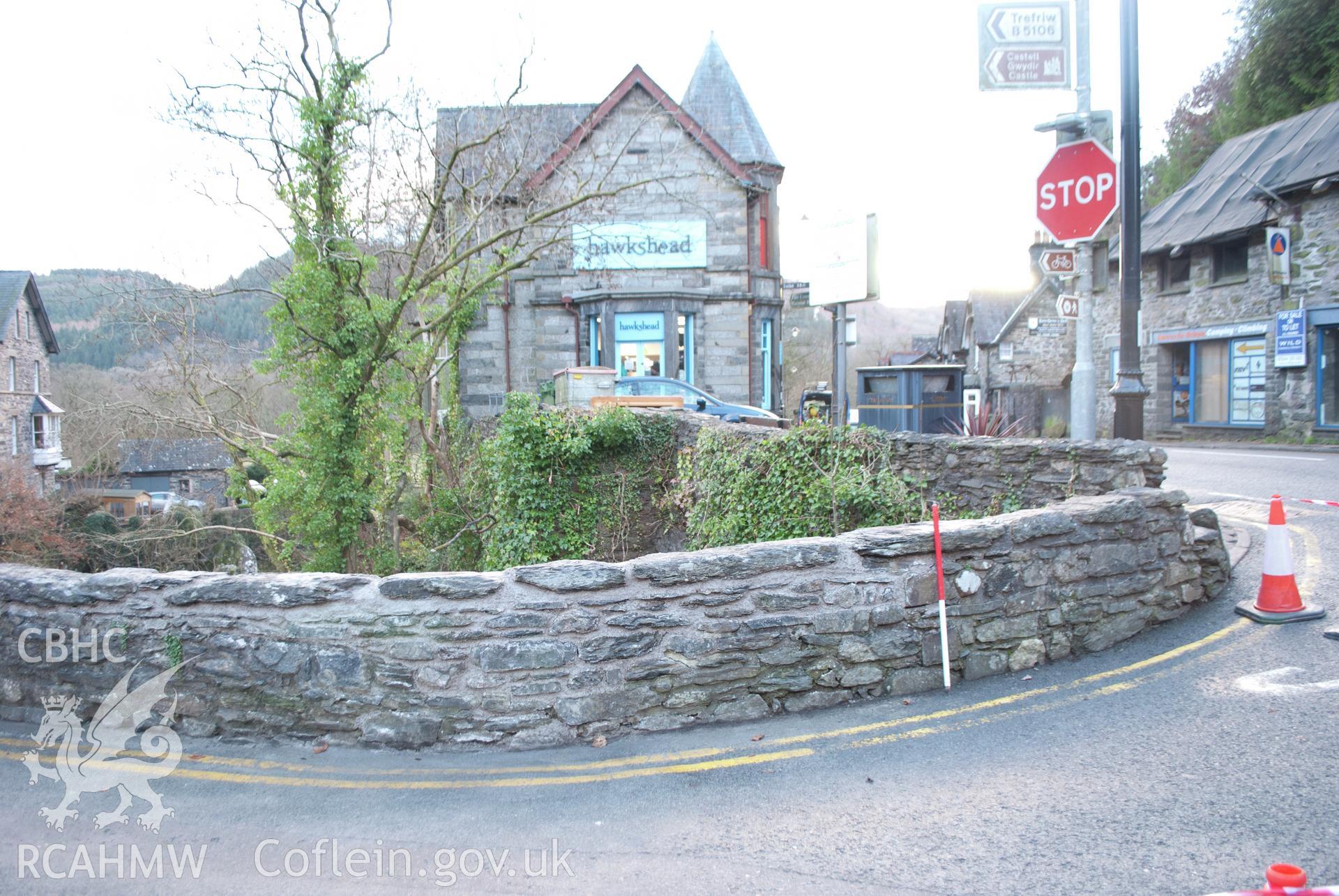 View of repaired southeast corner of the bridge parapet, viewed from the west south west. Digital photograph taken for Archaeological Watching Brief at Pont y Pair, Betws y Coed, 2019. Gwynedd Archaeological Trust Project no. G2587.