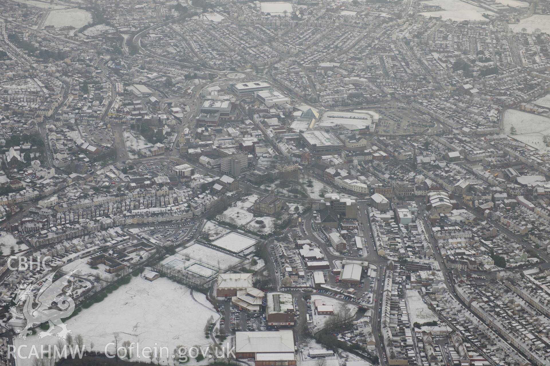 St Elli shopping centre and Llanelli town hall, Llanelli. Oblique aerial photograph taken during the Royal Commission?s programme of archaeological aerial reconnaissance by Toby Driver on 24th January 2013.