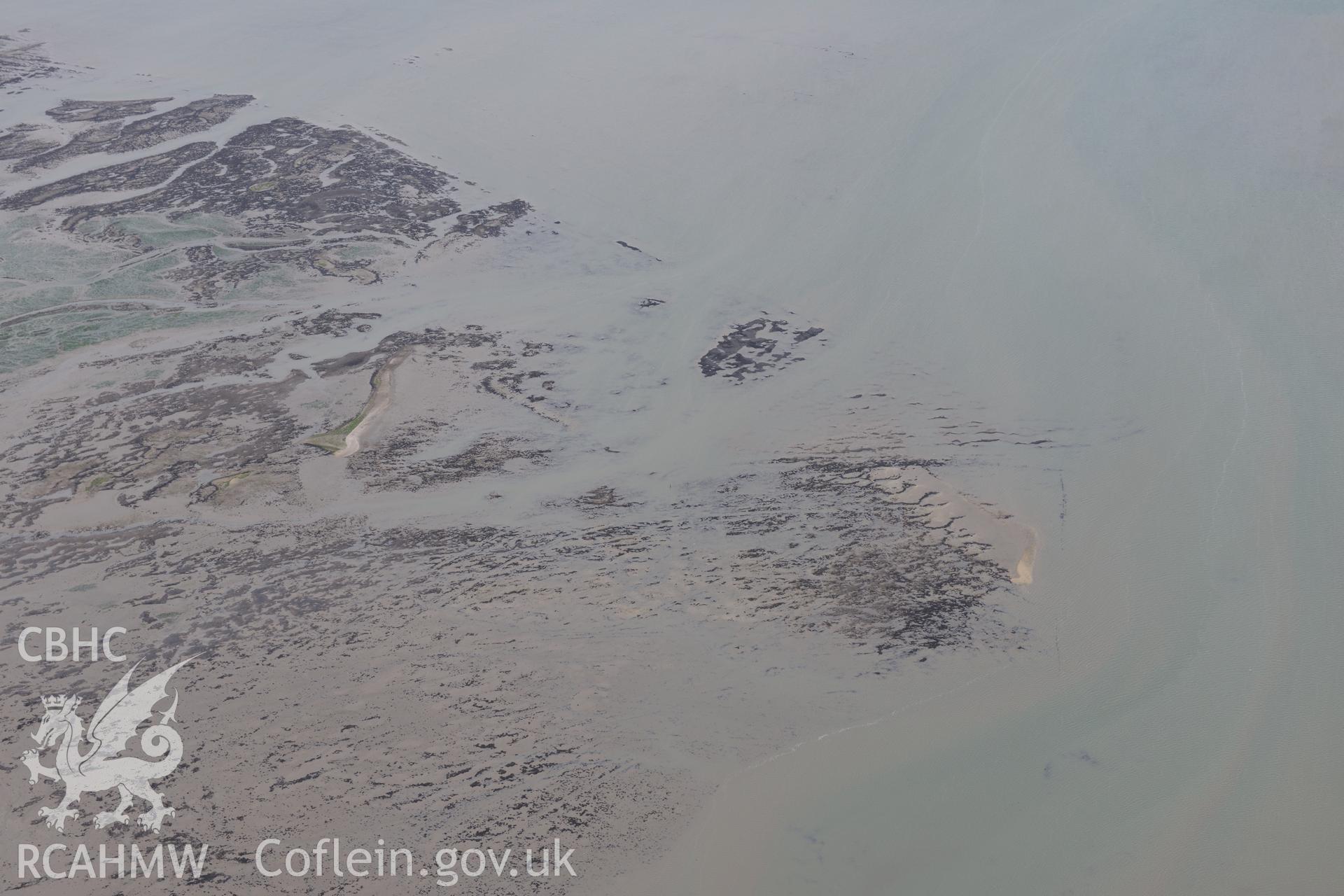 Ogwen Weir fish trap on the Bangor flats. Oblique aerial photograph taken during the Royal Commission's programme of archaeological aerial reconnaissance by Toby Driver on 11th September 2015.