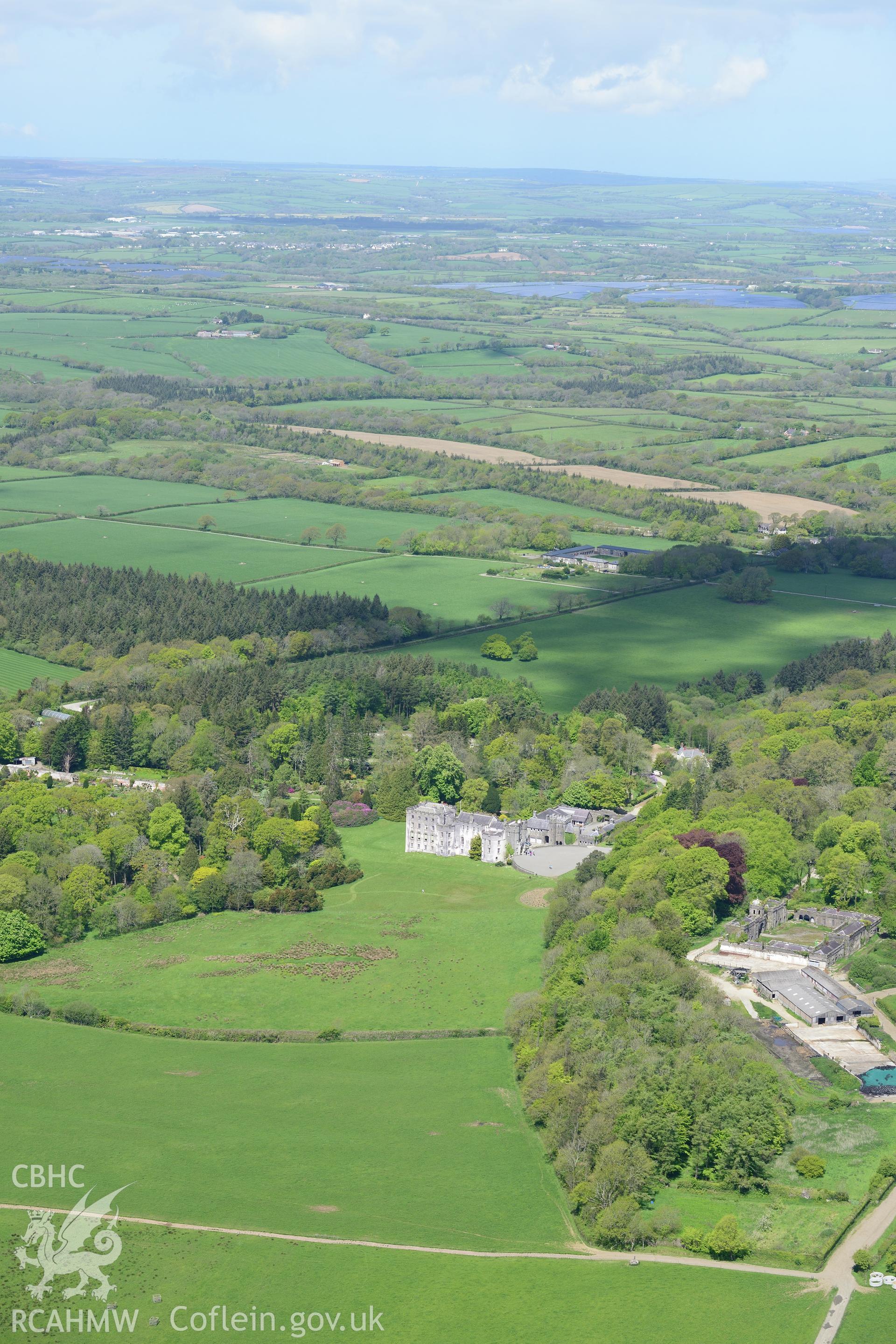 Picton Castle, its gardens and its stables, Slebech. Oblique aerial photograph taken during the Royal Commission's programme of archaeological aerial reconnaissance by Toby Driver on 13th May 2015.