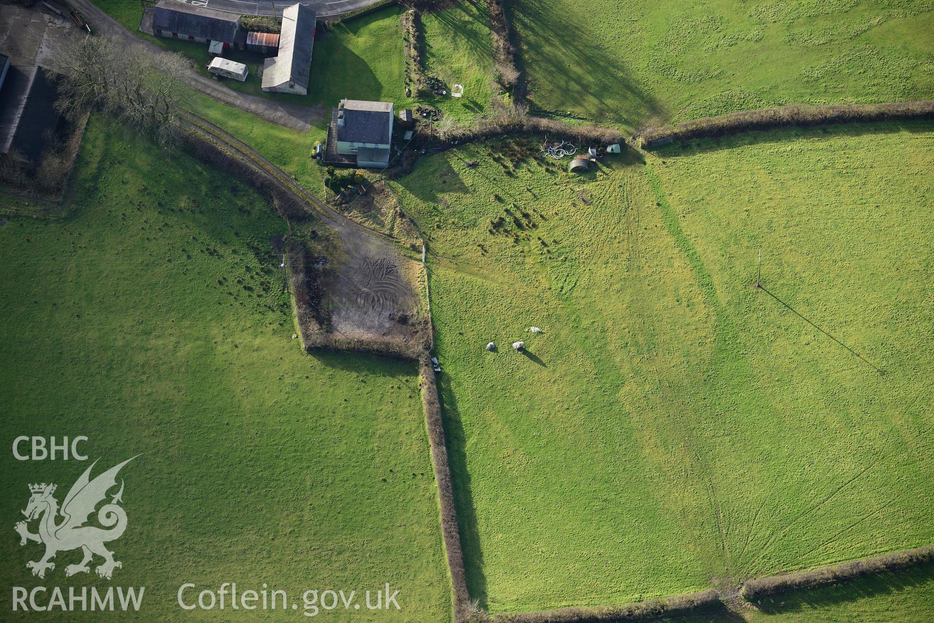 Llech Ciste, Llanegwad. Oblique aerial photograph taken during the Royal Commission's programme of archaeological aerial reconnaissance by Toby Driver on 6th January 2015.