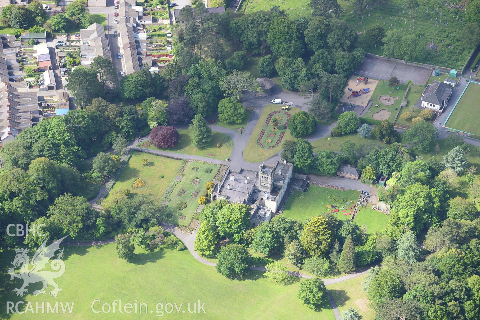 Bryncaerau Castle (now Parc Howard Museum); Parc Howard Gardens and the grounds and gardens of Bryncaerau, on the north western outskirts of Llanelli. Oblique aerial photograph taken during the Royal Commission's programme of archaeological aerial reconnaissance by Toby Driver on 19th June 2018