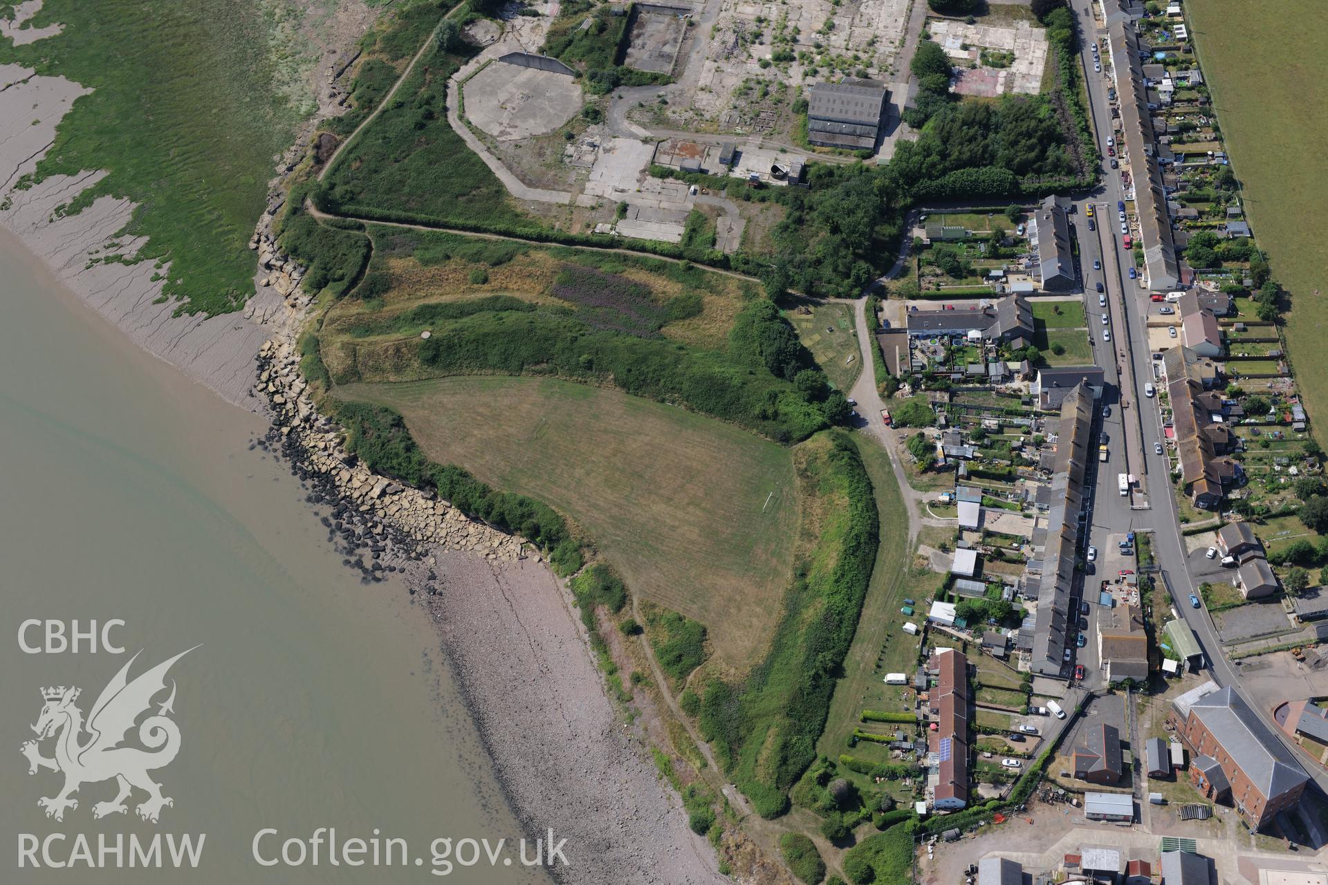 Sudbrook village, east of Caldicot, with Sudbrook fort, pumping station & the remains of Sudbrook medieval village. Oblique aerial photograph taken during Royal Commission?s programme of archaeological aerial reconnaissance by Toby Driver, 1st August 2013.