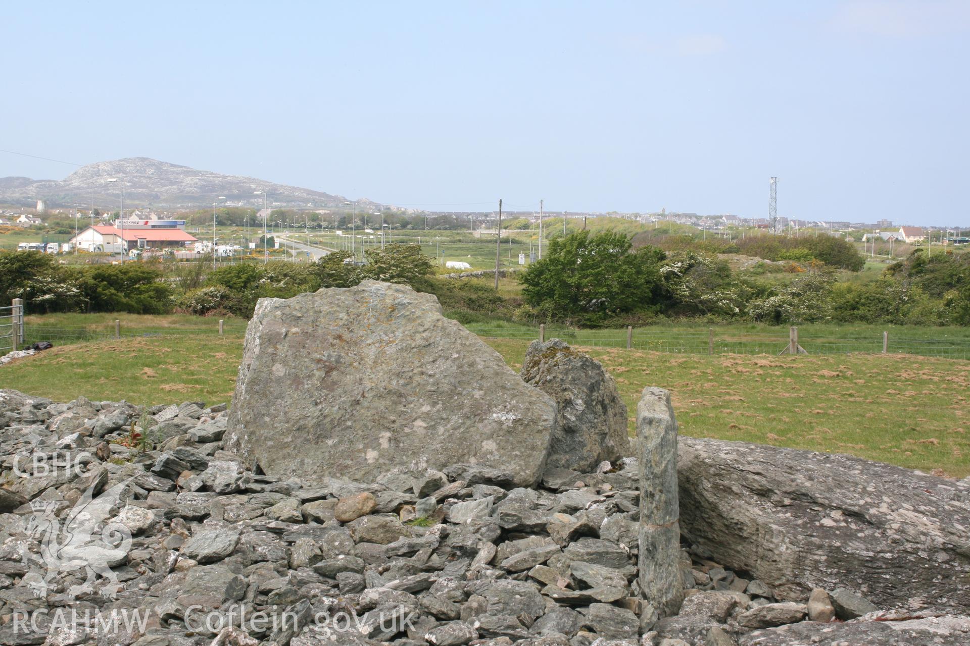 View northwest across the first and second tombs of Trefignath Burial Chamber. Digital photograph taken as part of archaeological work at Parc Cybi Enterprise Zone, Holyhead, Anglesey, carried out by Archaeology Wales, 2017. Project number: P2522.