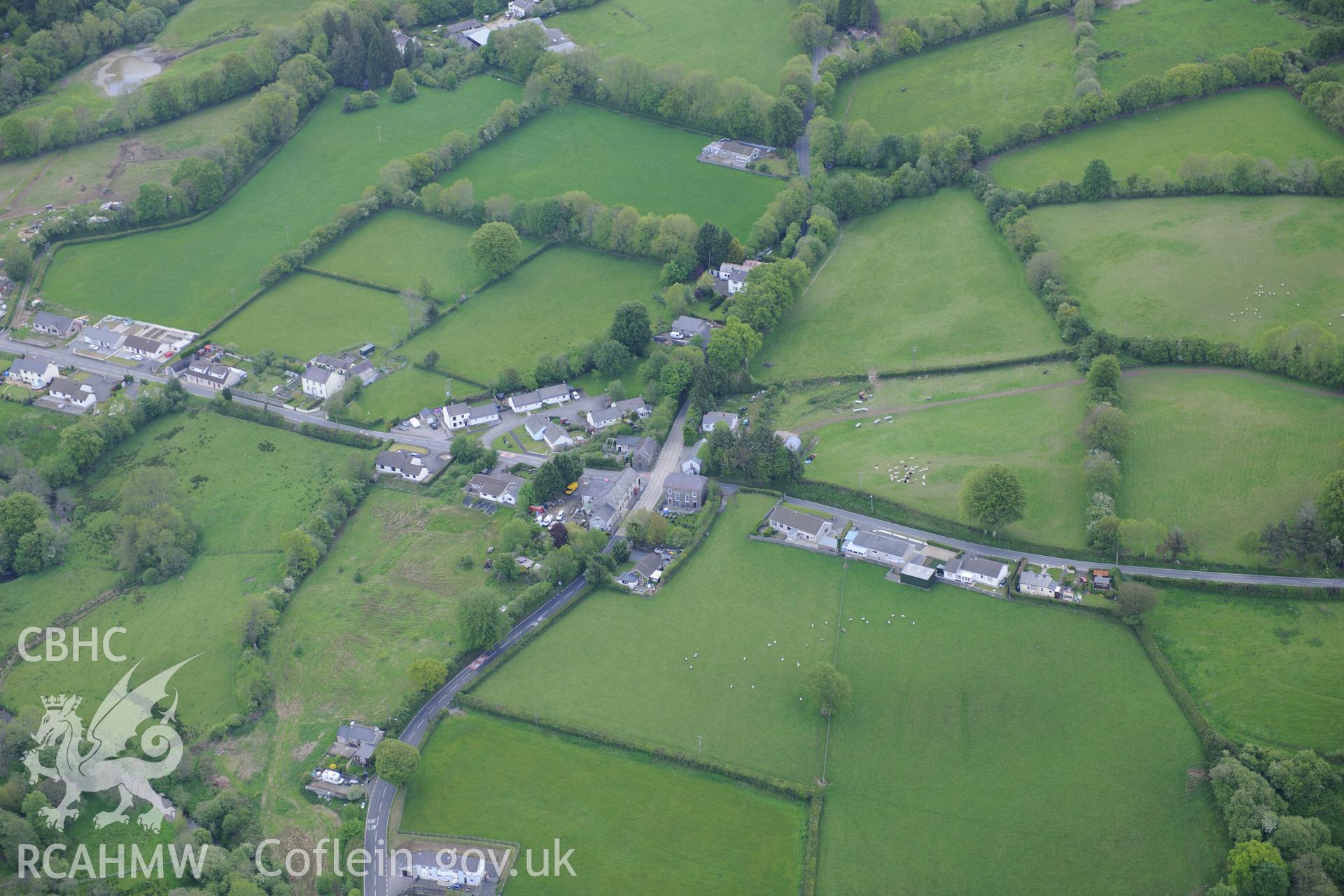 The village of Rhydowen, showing Yr Hen Gapel; Allyrodyn Arms and Alltyrodyn Arms pigsty and stable. Oblique aerial photograph taken during the Royal Commission's programme of archaeological aerial reconnaissance by Toby Driver on 3rd June 2015.