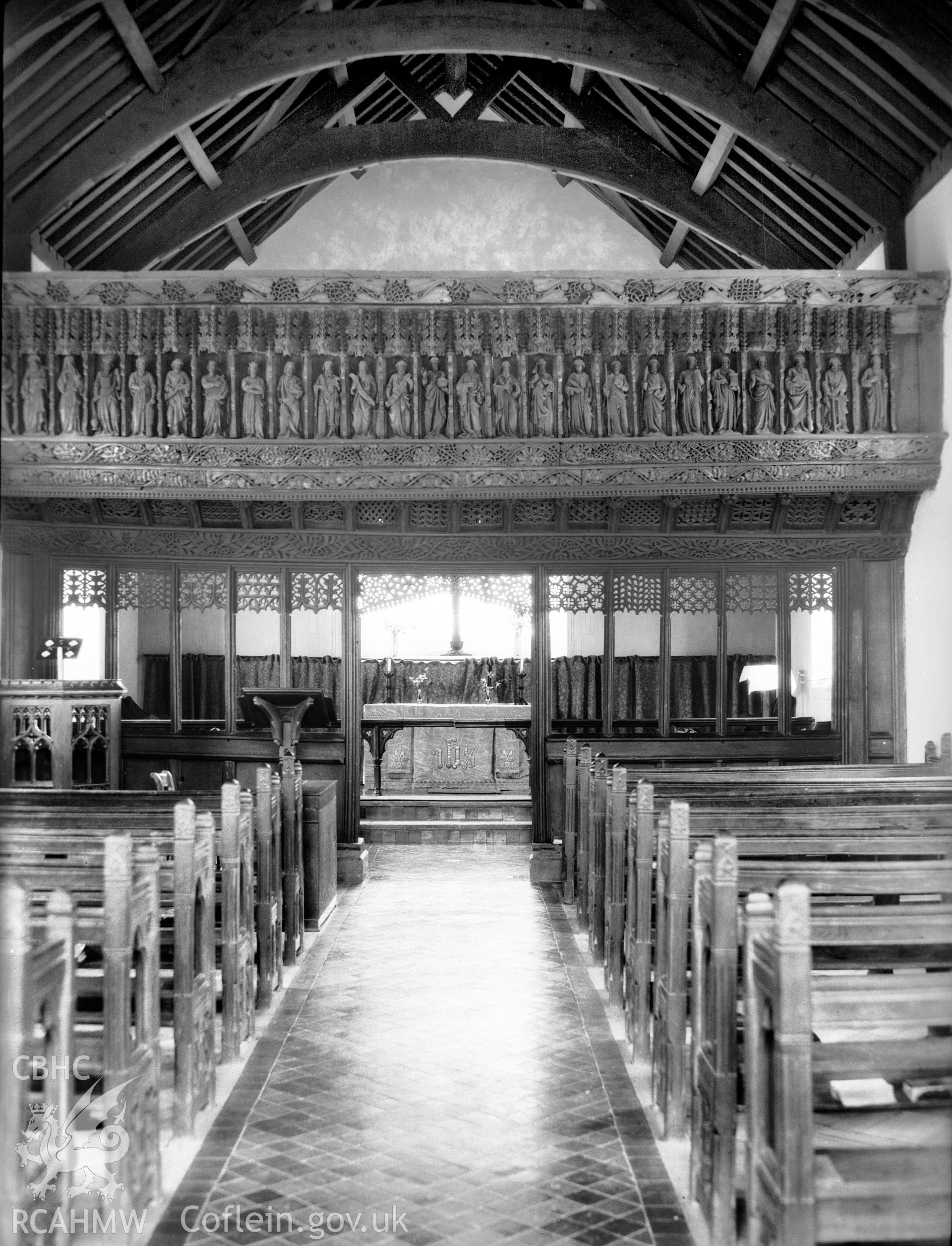 Digital copy of a nitrate negative showing interior view of screen, from west, St Anno's Church, Llananno. From the National Building Record Postcard Collection.