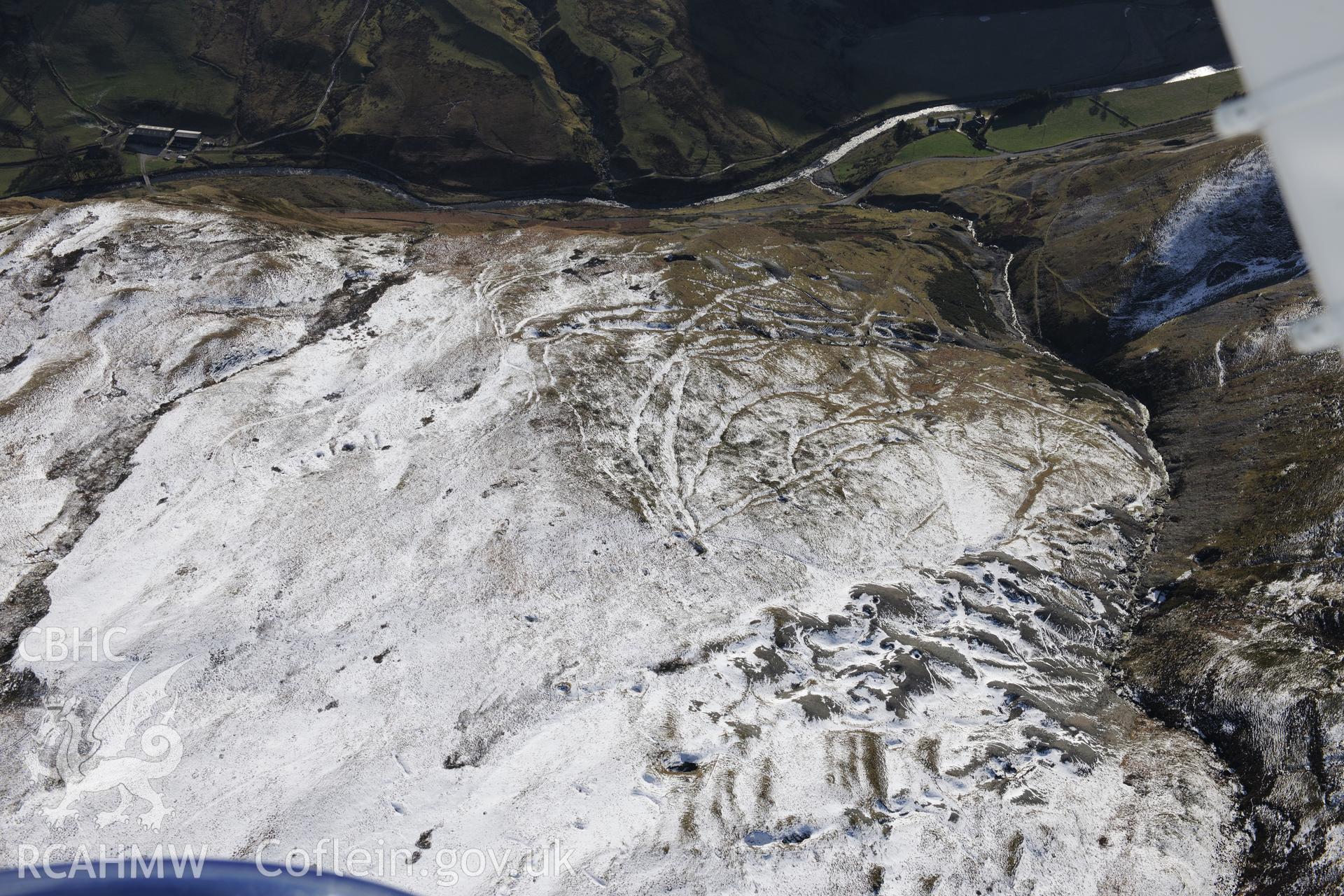 Former Copa Hill opencast mine, Cwmystwyth, south west of Llangurig. Oblique aerial photograph taken during the Royal Commission's programme of archaeological aerial reconnaissance by Toby Driver on 4th February 2015.