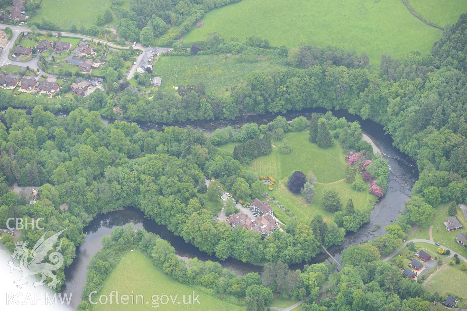 Caerberis mansion and garden, plus Caer Beris motte, near Cilmery. Oblique aerial photograph taken during the Royal Commission's programme of archaeological aerial reconnaissance by Toby Driver on 11th June 2015.