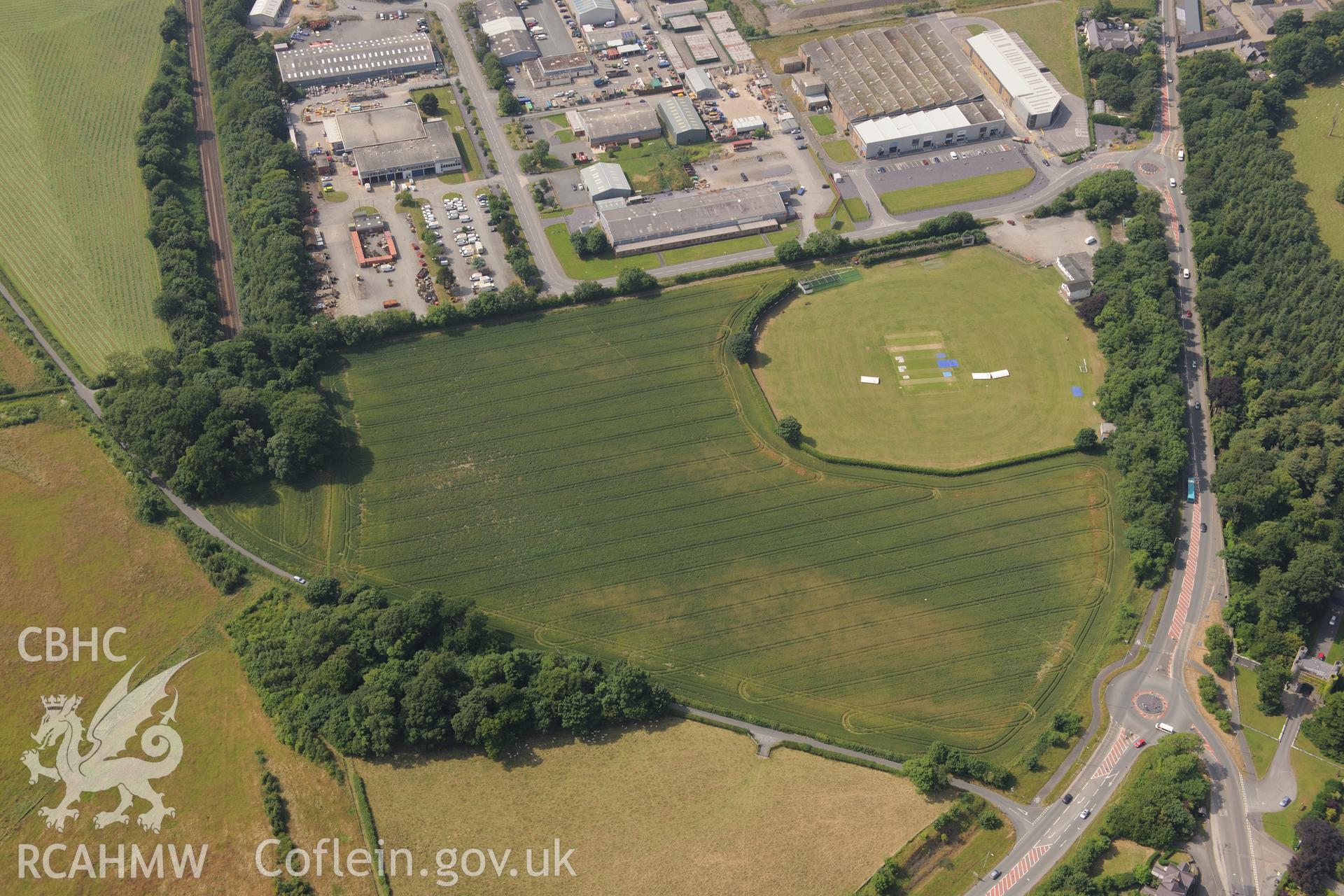 Llandegai henge monuments and cursus. Oblique aerial photograph taken during the Royal Commission?s programme of archaeological aerial reconnaissance by Toby Driver on 12th July 2013.