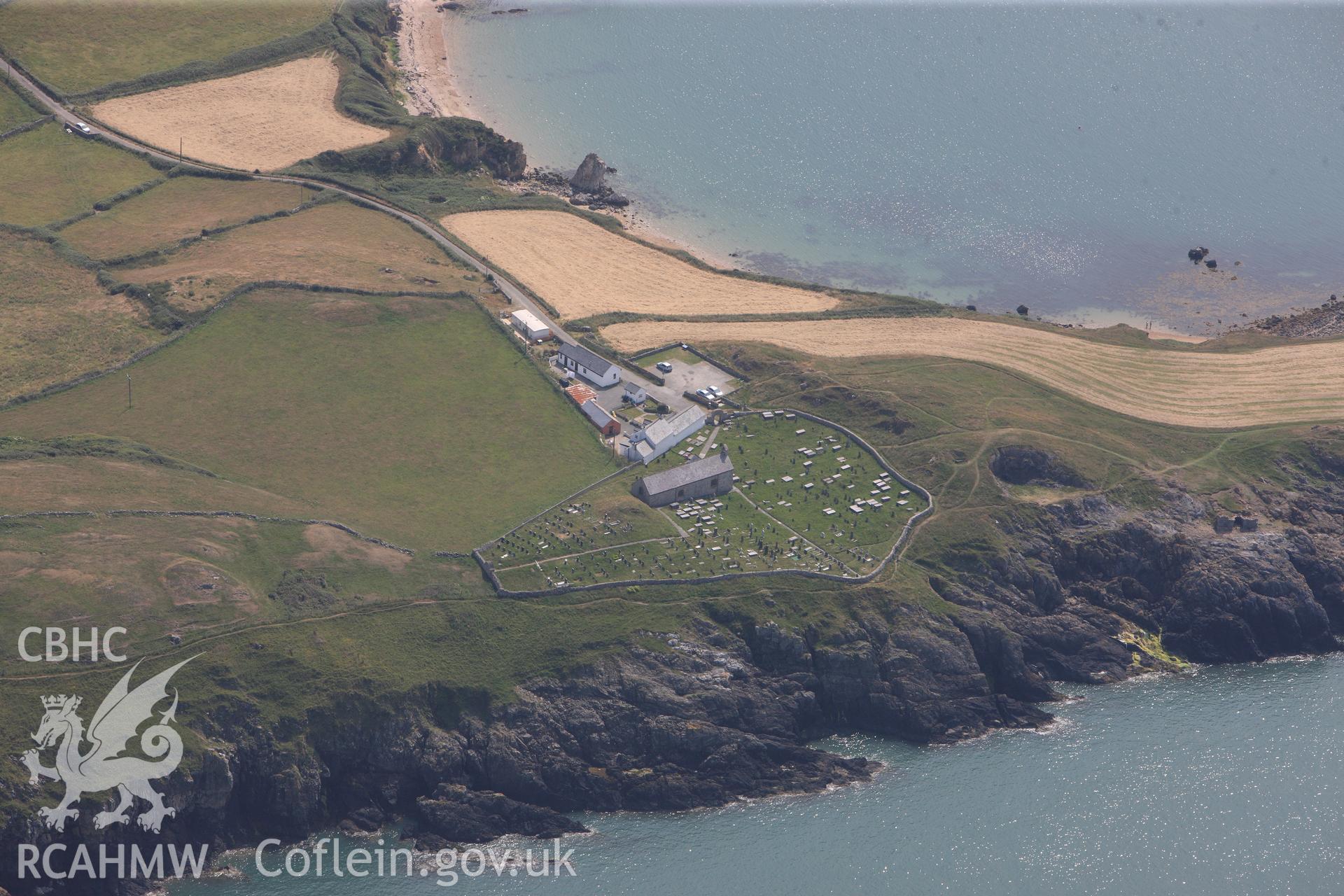 St Patrick's Church, Llanbadrig. Oblique aerial photograph taken during the Royal Commission?s programme of archaeological aerial reconnaissance by Toby Driver on 12th July 2013.