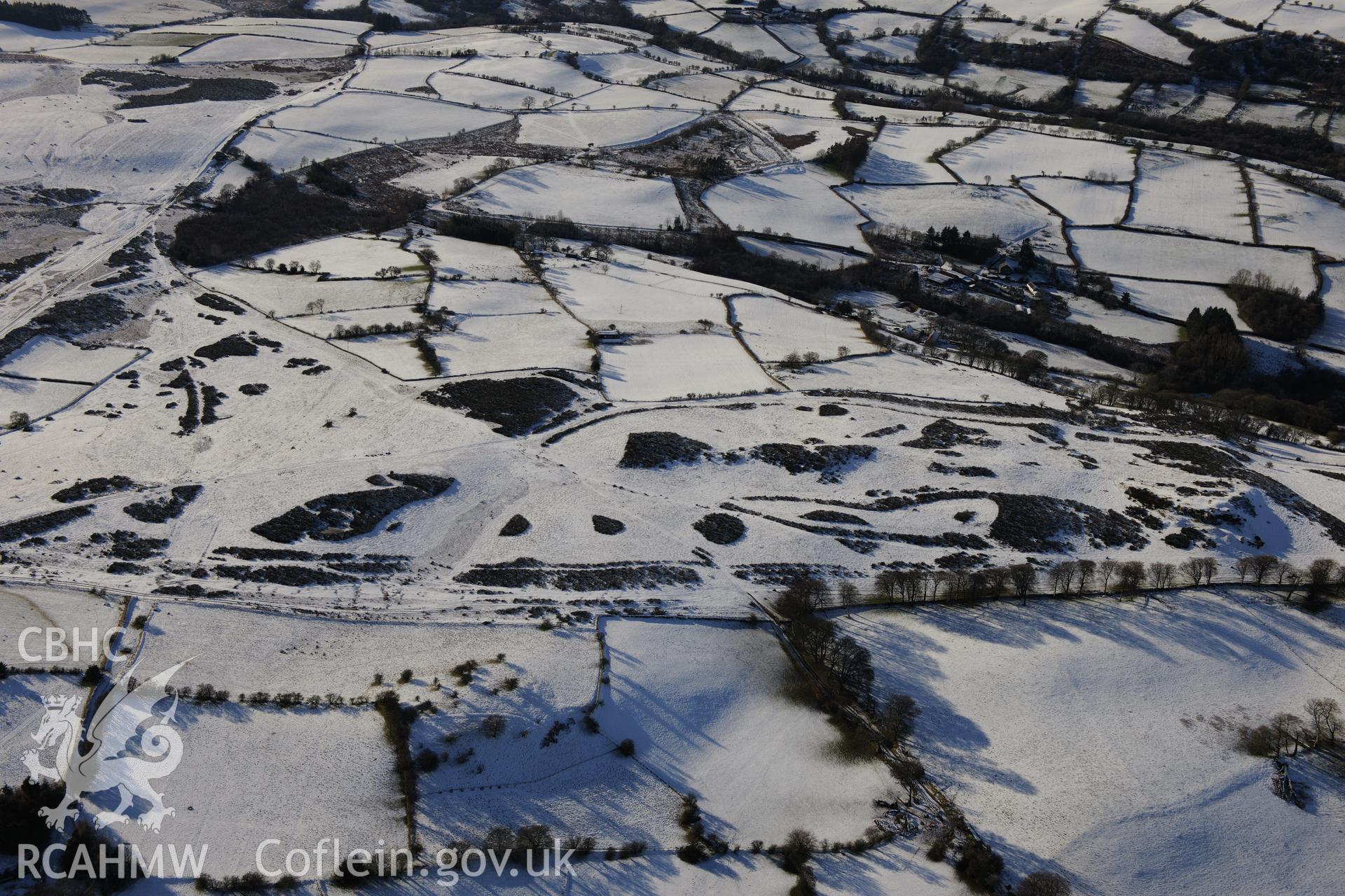 Roman road on Mynydd Illtud passing through Blaengwrthyd, south west of Brecon. Oblique aerial photograph taken during the Royal Commission?s programme of archaeological aerial reconnaissance by Toby Driver on 15th January 2013.