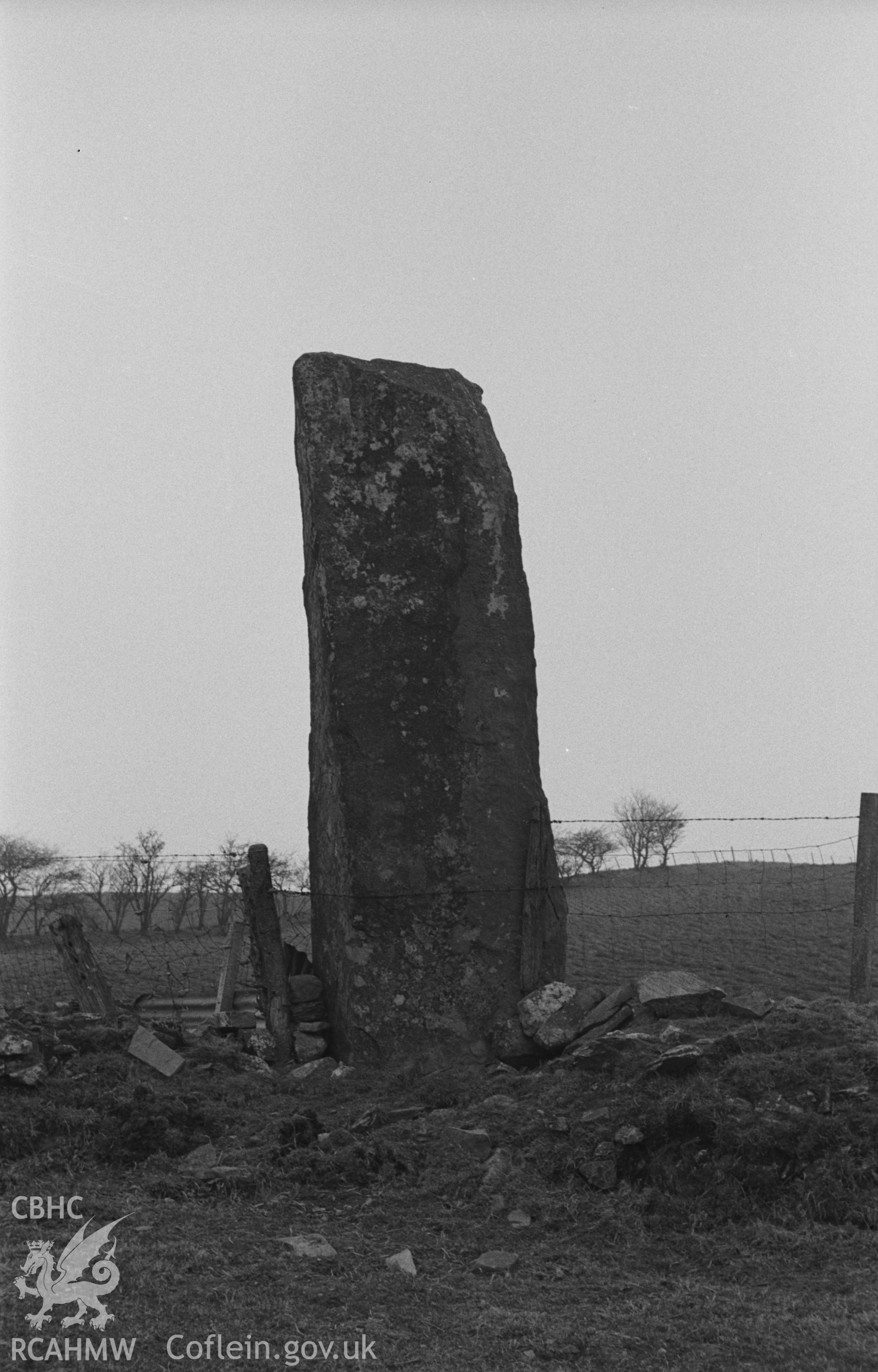 Digital copy of a black and white negative showing Carreg Hirfaen, Llanycrwys, defining the border between Ceredigion and Carmarthenshire. Photographed in April 1963 by Arthur O. Chater from Grid Reference SN 6247 4645, looking west.